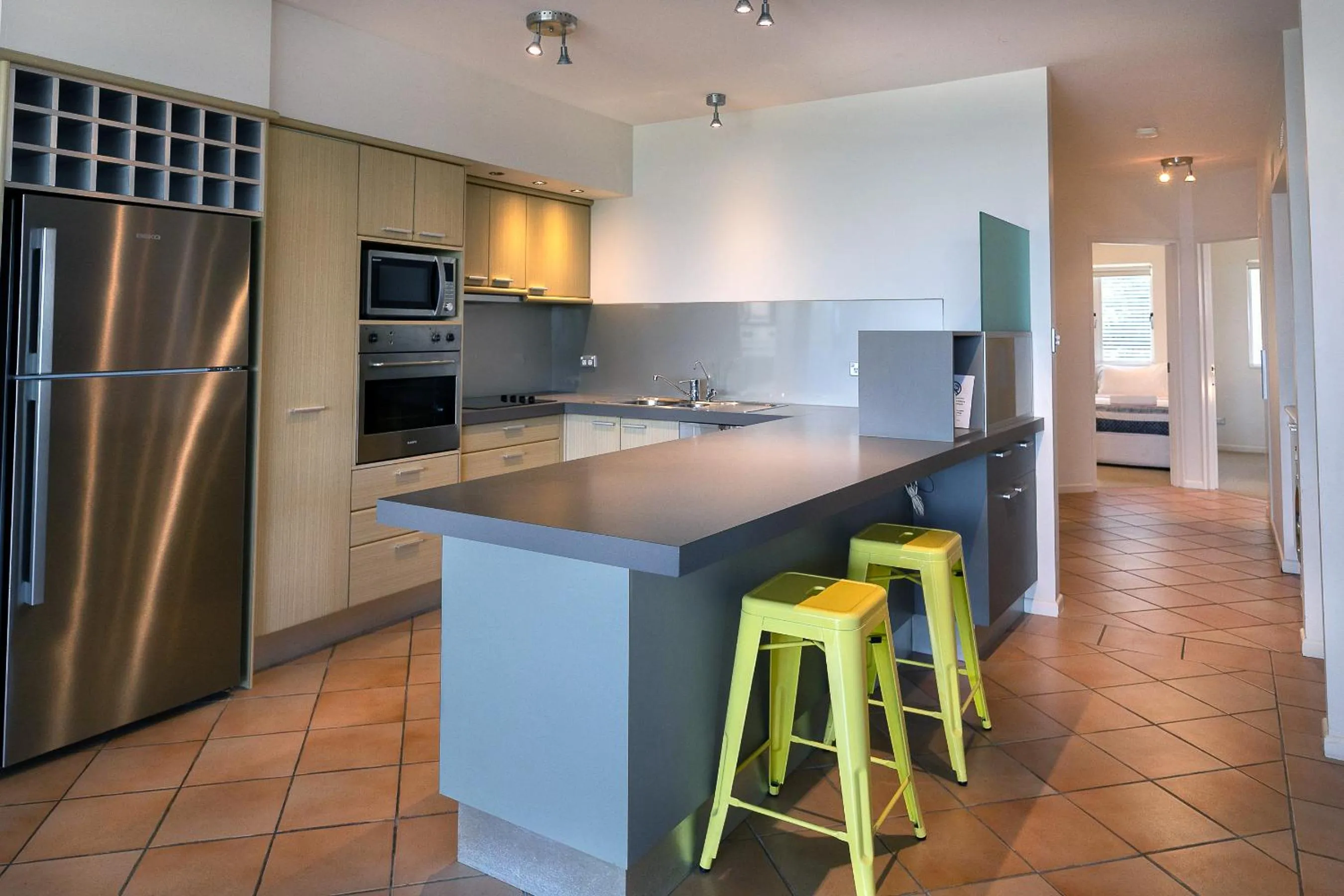 Kitchen or kitchenette in Aqua Promenade Beachfront Holiday Apartments