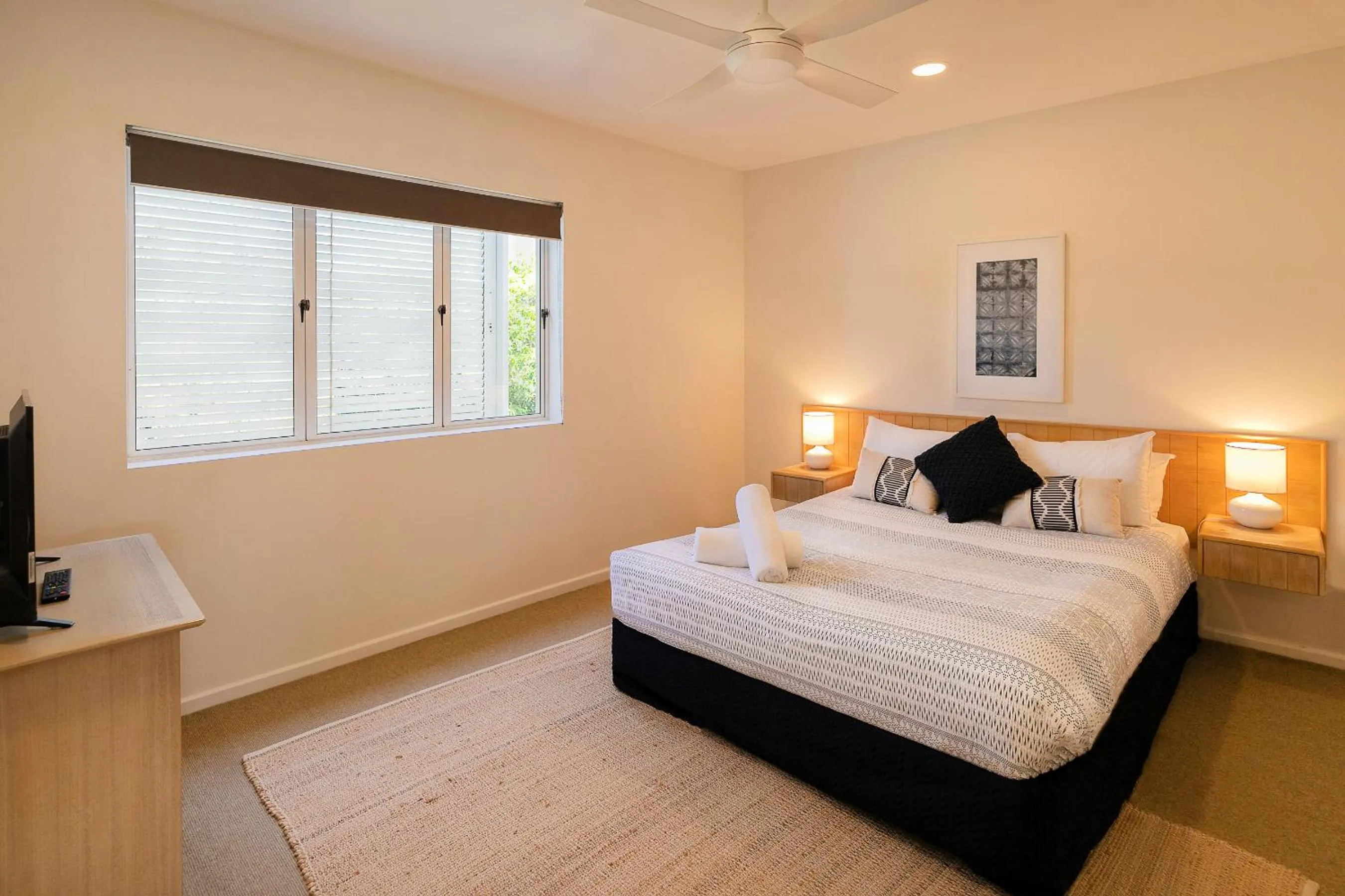 Bed in Aqua Promenade Beachfront Holiday Apartments