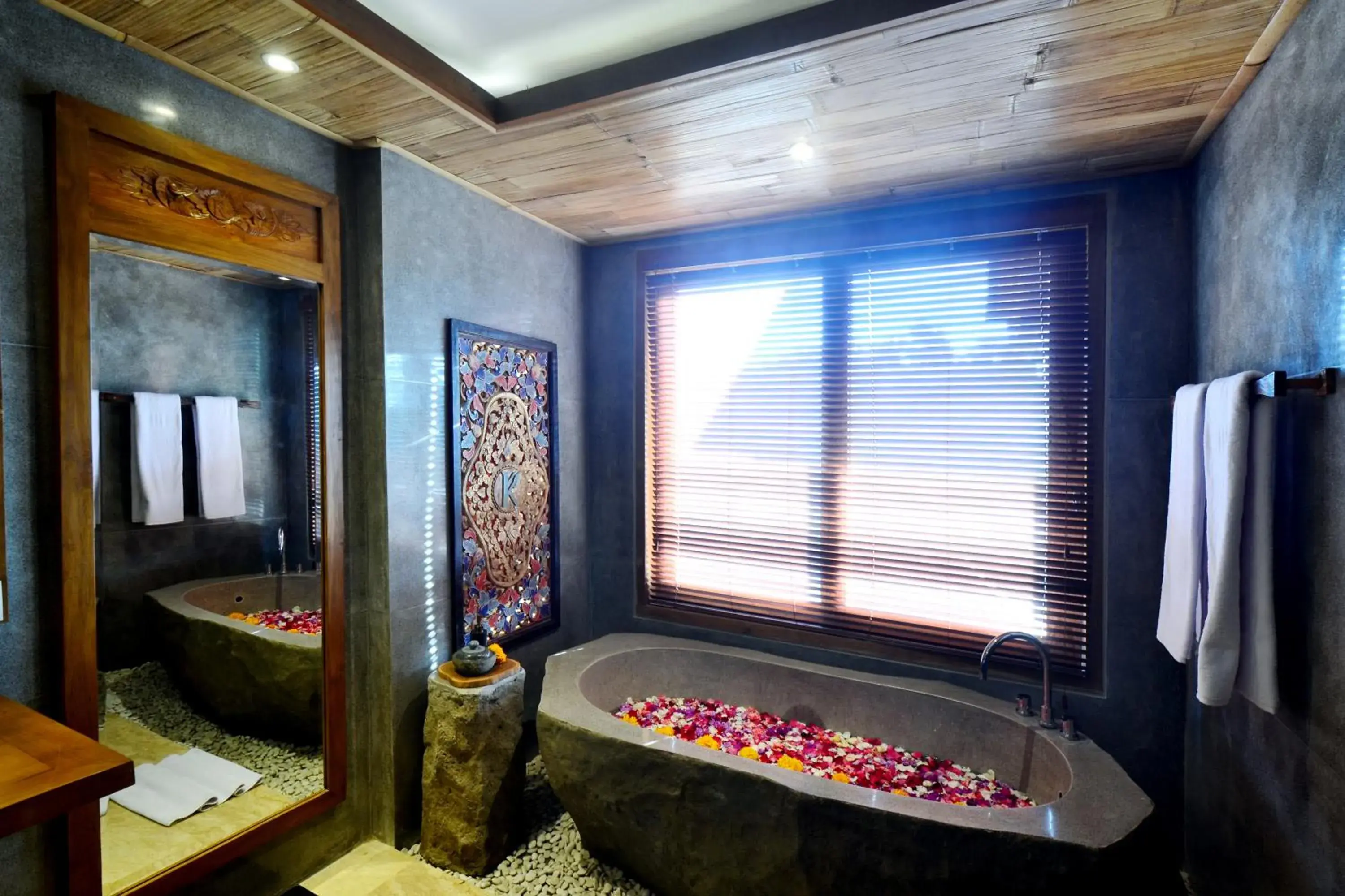 Bathroom in Kenran Resort Ubud By Soscomma Bathroom in Kenran Resort Ubud By Soscomma
