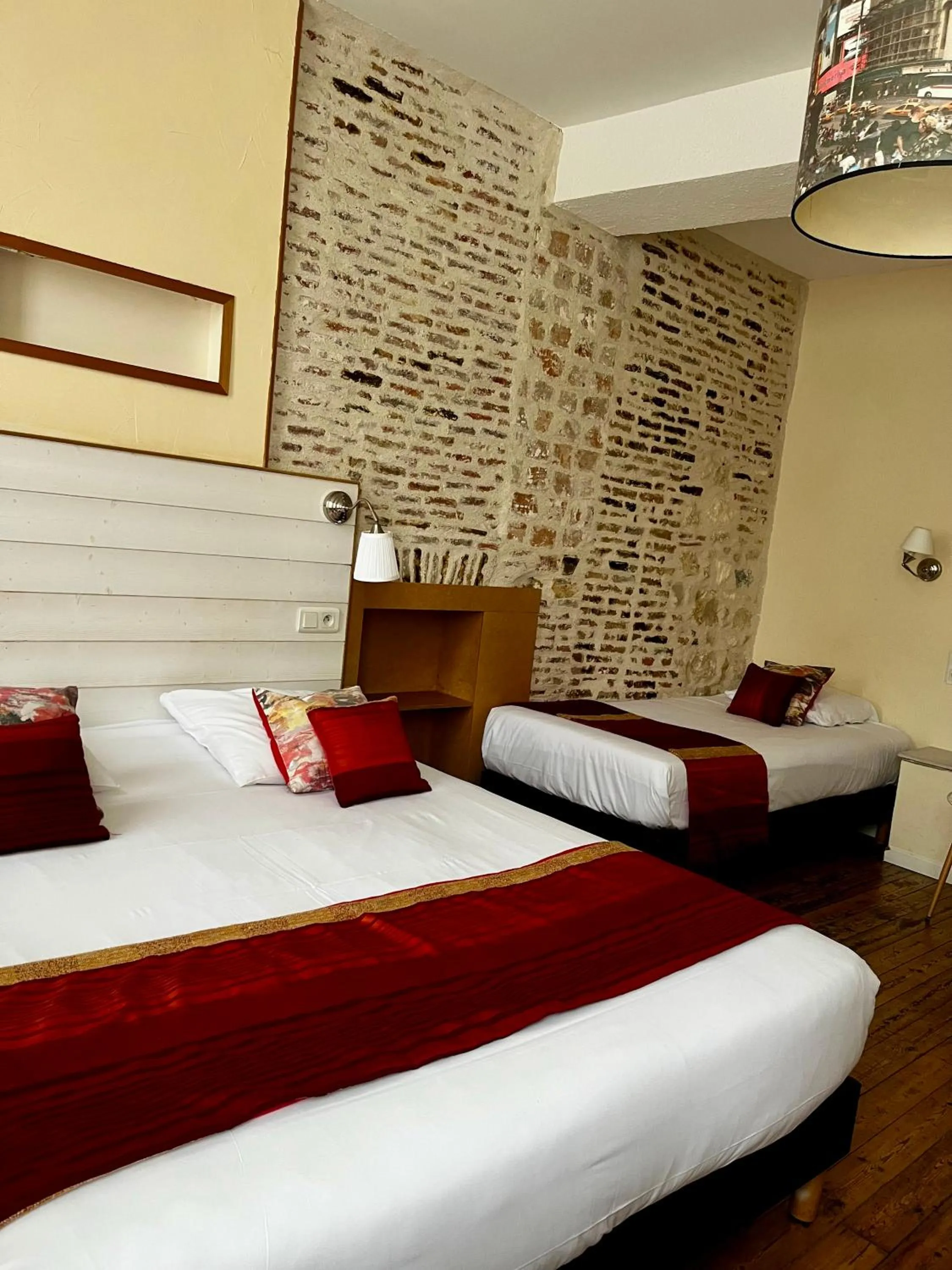 Bed in Hotel de La Paix