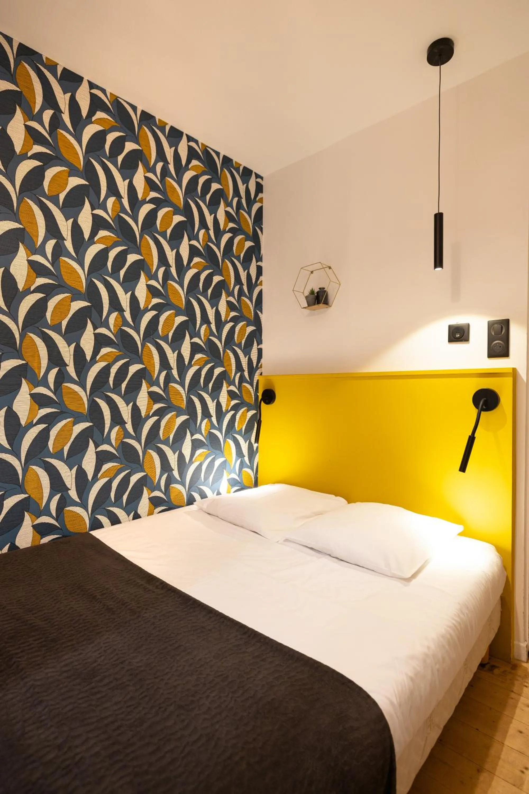 Bed in Hotel de La Paix