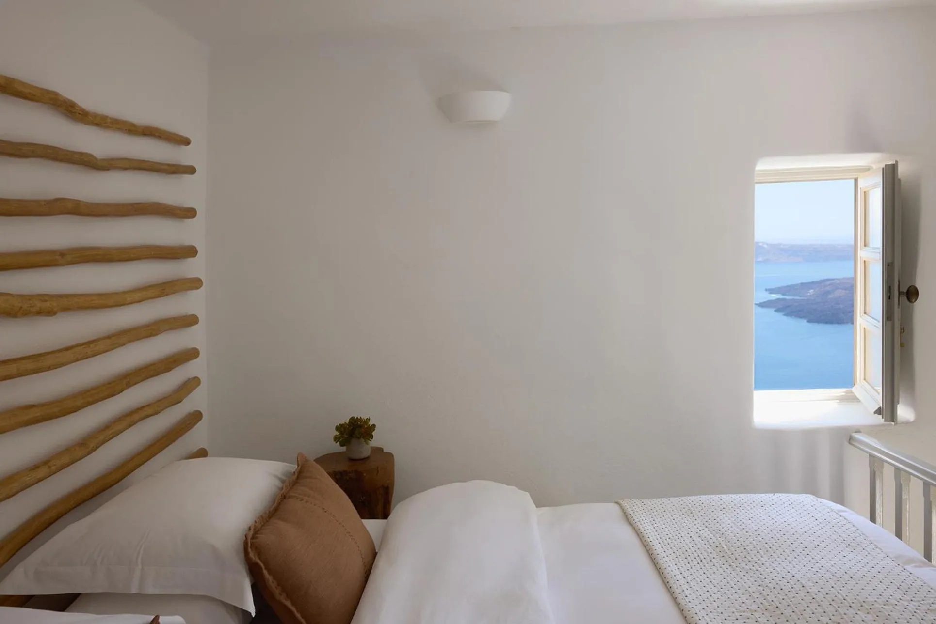 Bed in Iconic Santorini, a Boutique Cave Hotel by Sandglass