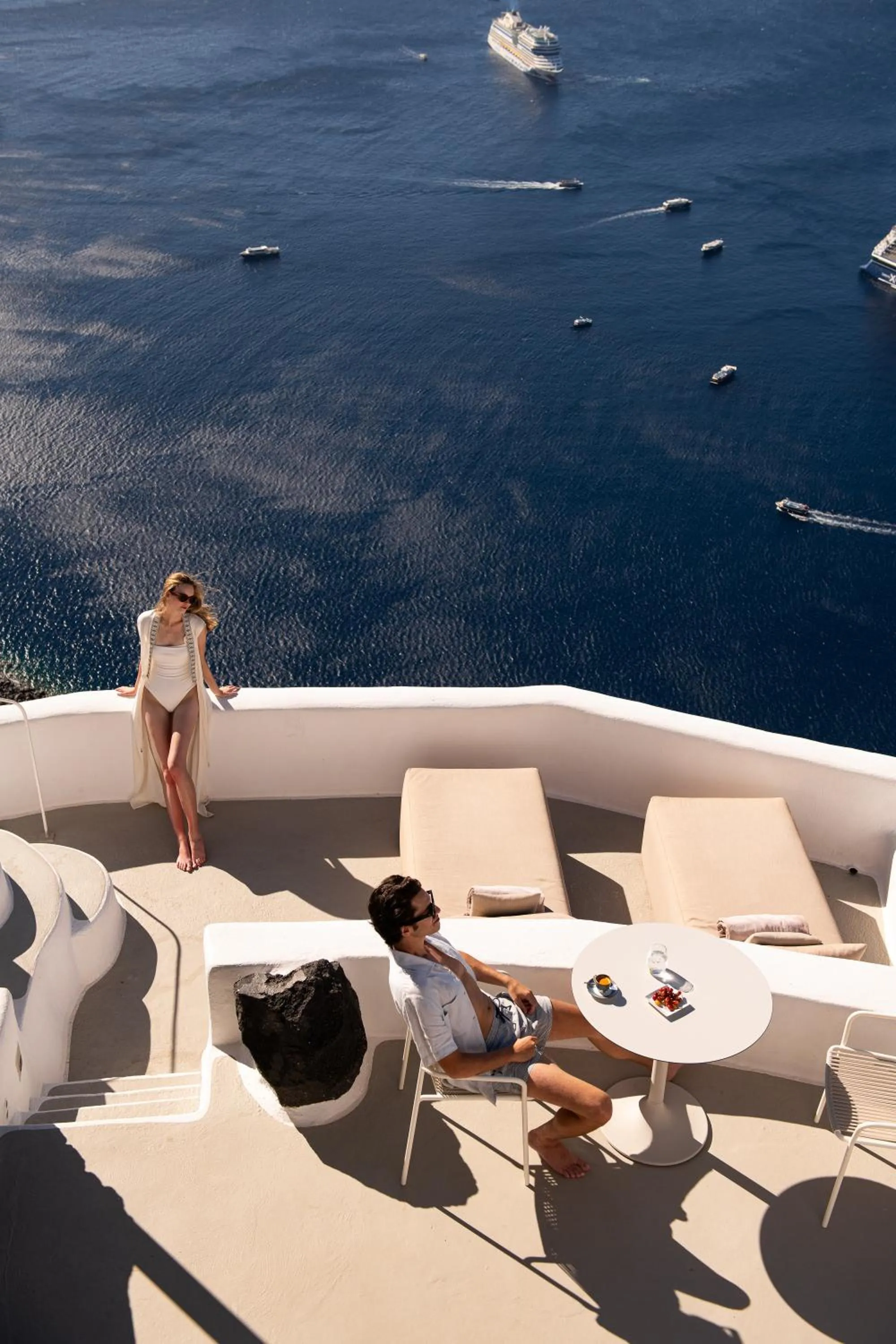 People in Iconic Santorini, a Boutique Cave Hotel by Sandglass