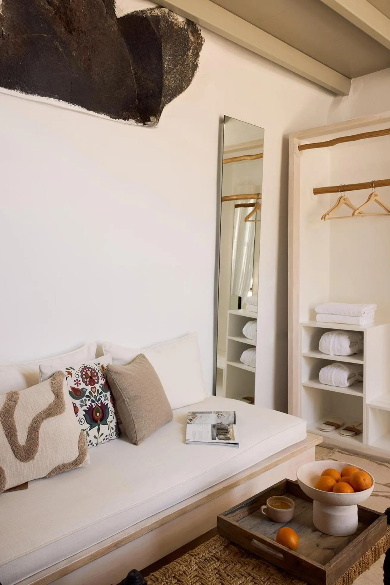 Seating area, Bed in Iconic Santorini, a Boutique Cave Hotel by Sandglass