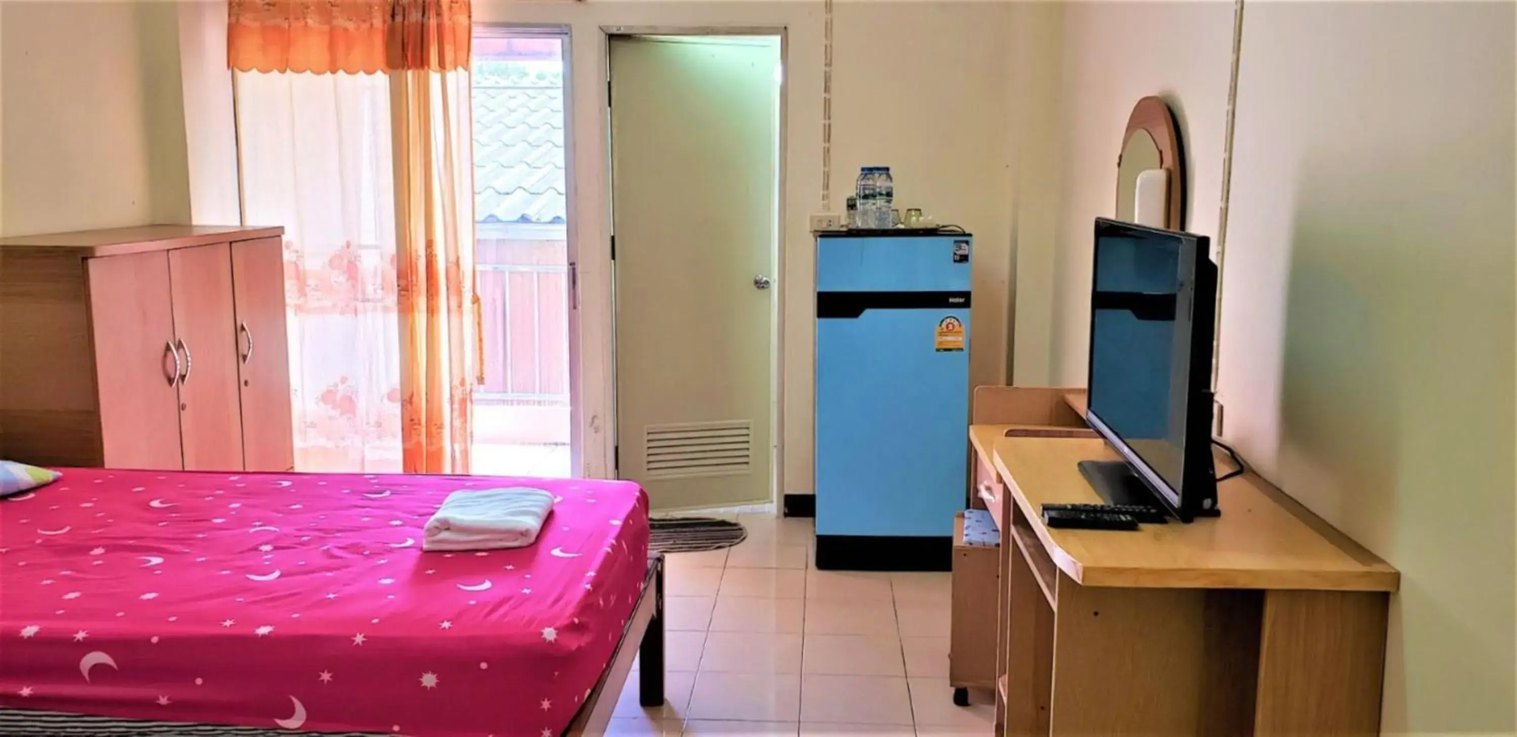 Seating area, Bed in Baan Yuyuen Seating area, Bed in Baan Yuyuen