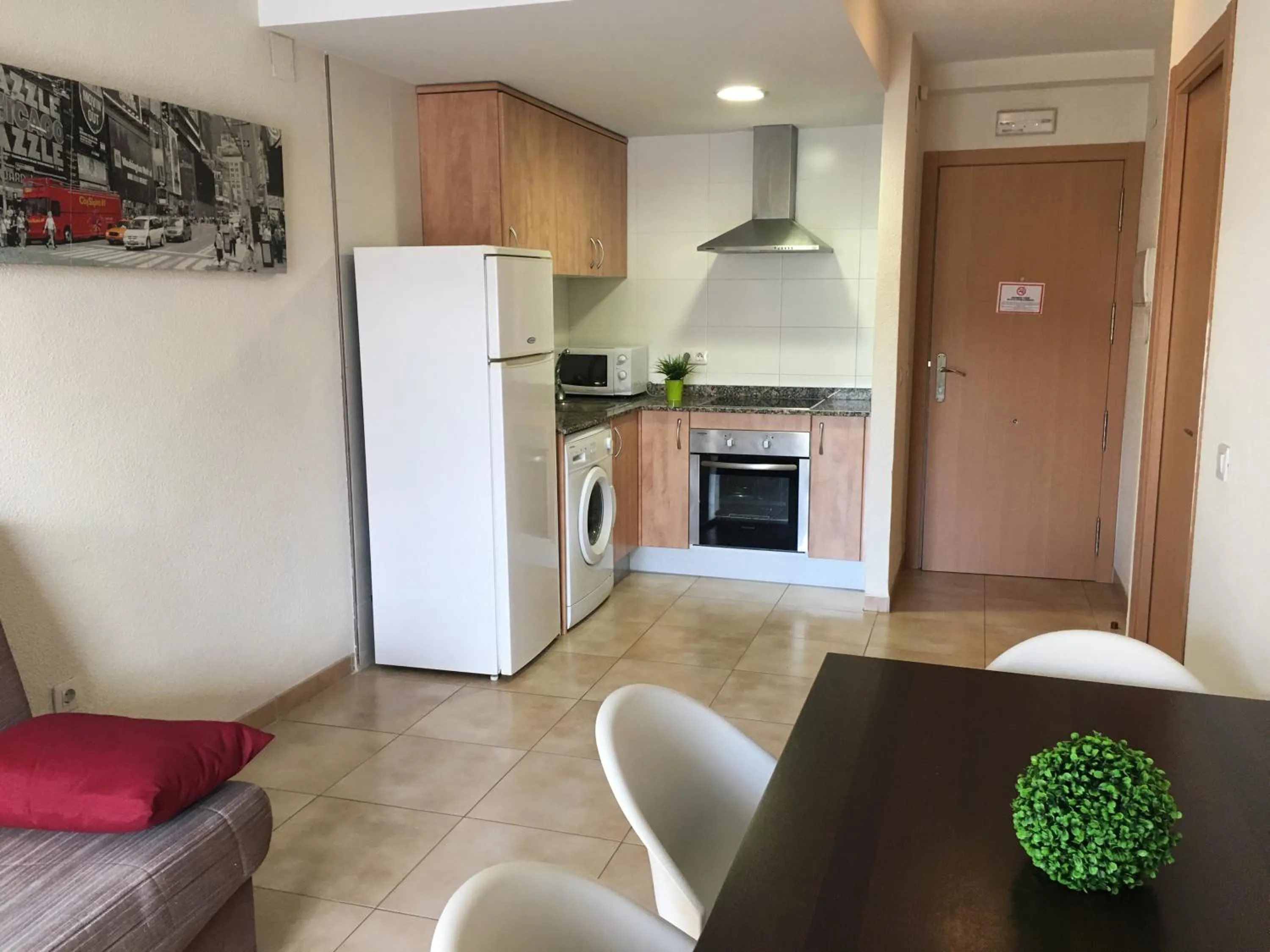 Kitchen or kitchenette in Apartamentos Doña Carmen 3000