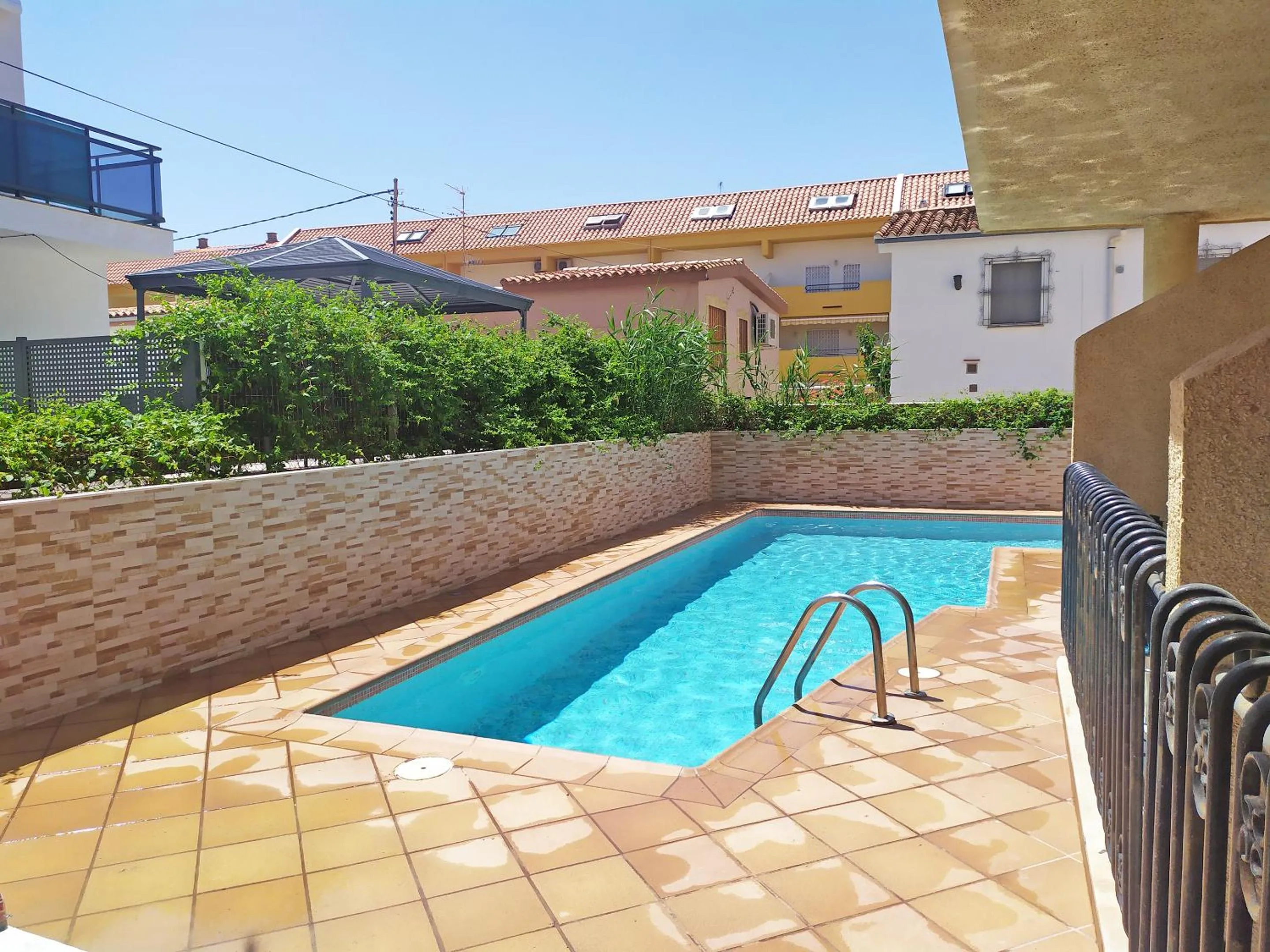 Swimming pool in Apartamentos Doña Carmen 3000