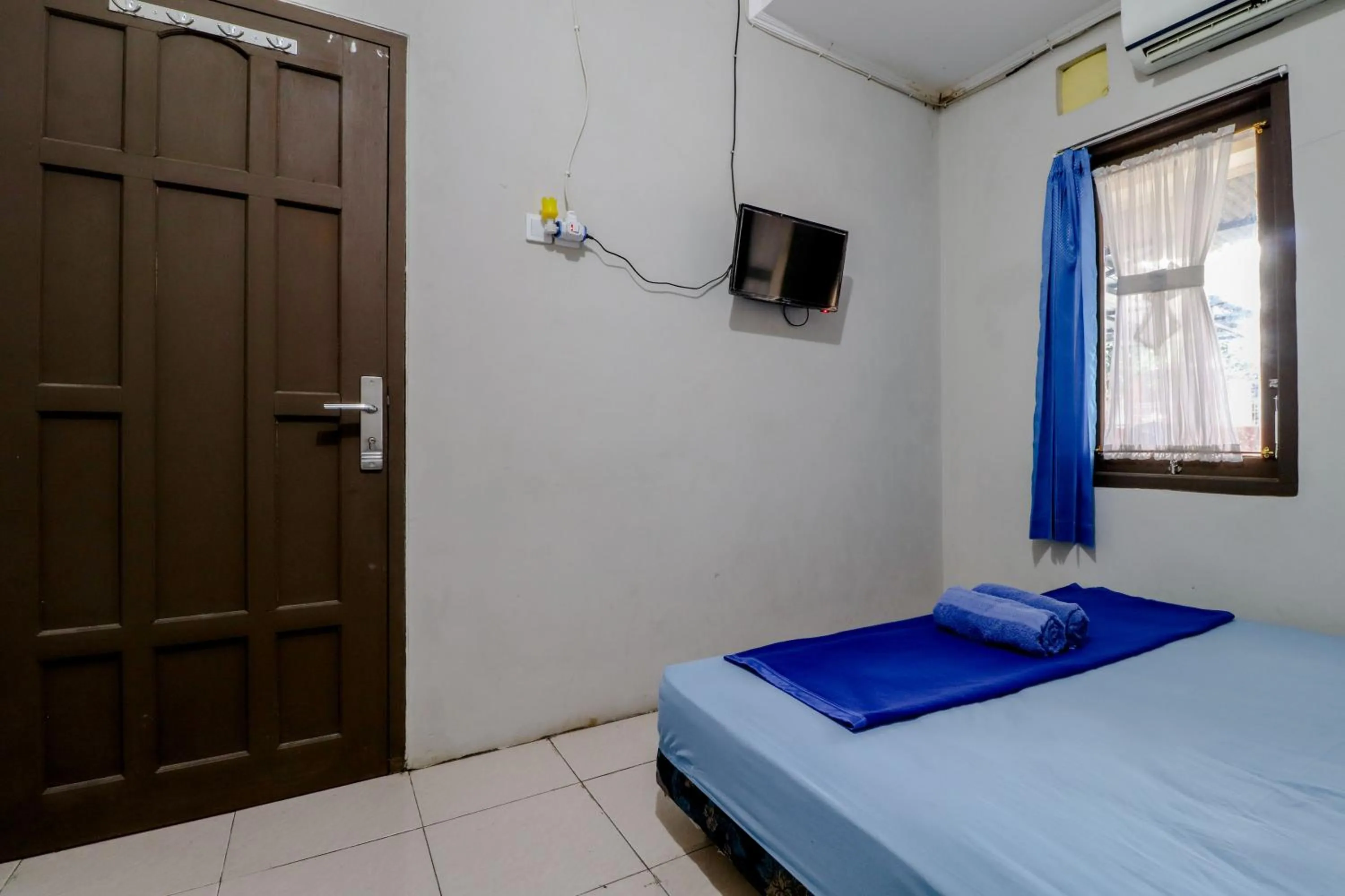 Communal lounge/ TV room, Bed in Homestay Damandiri Prambanan Syariah