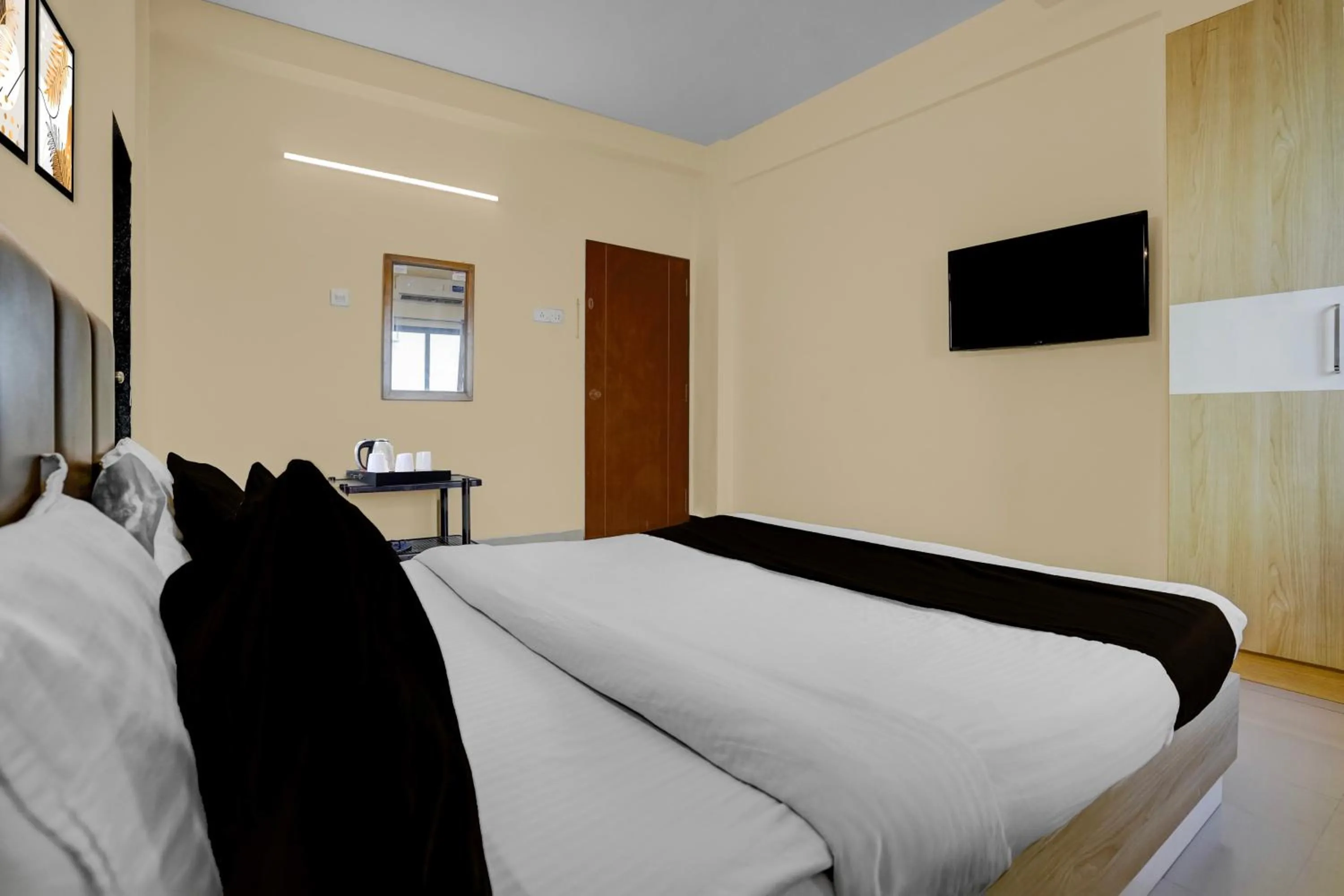 Bedroom in Hotel O Vapi GIDC Formerly Zion Inn