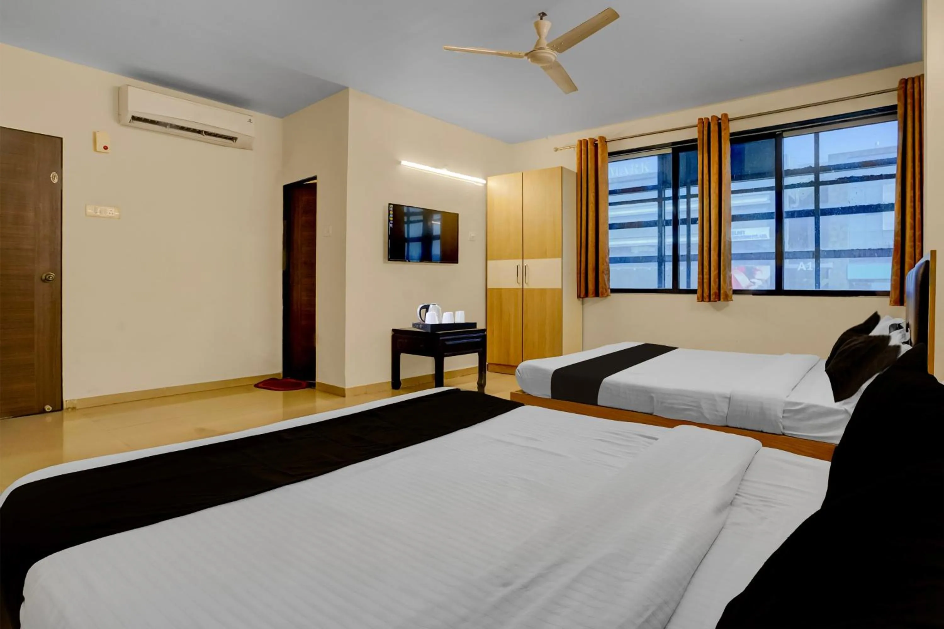 Bedroom in Hotel O Vapi GIDC Formerly Zion Inn