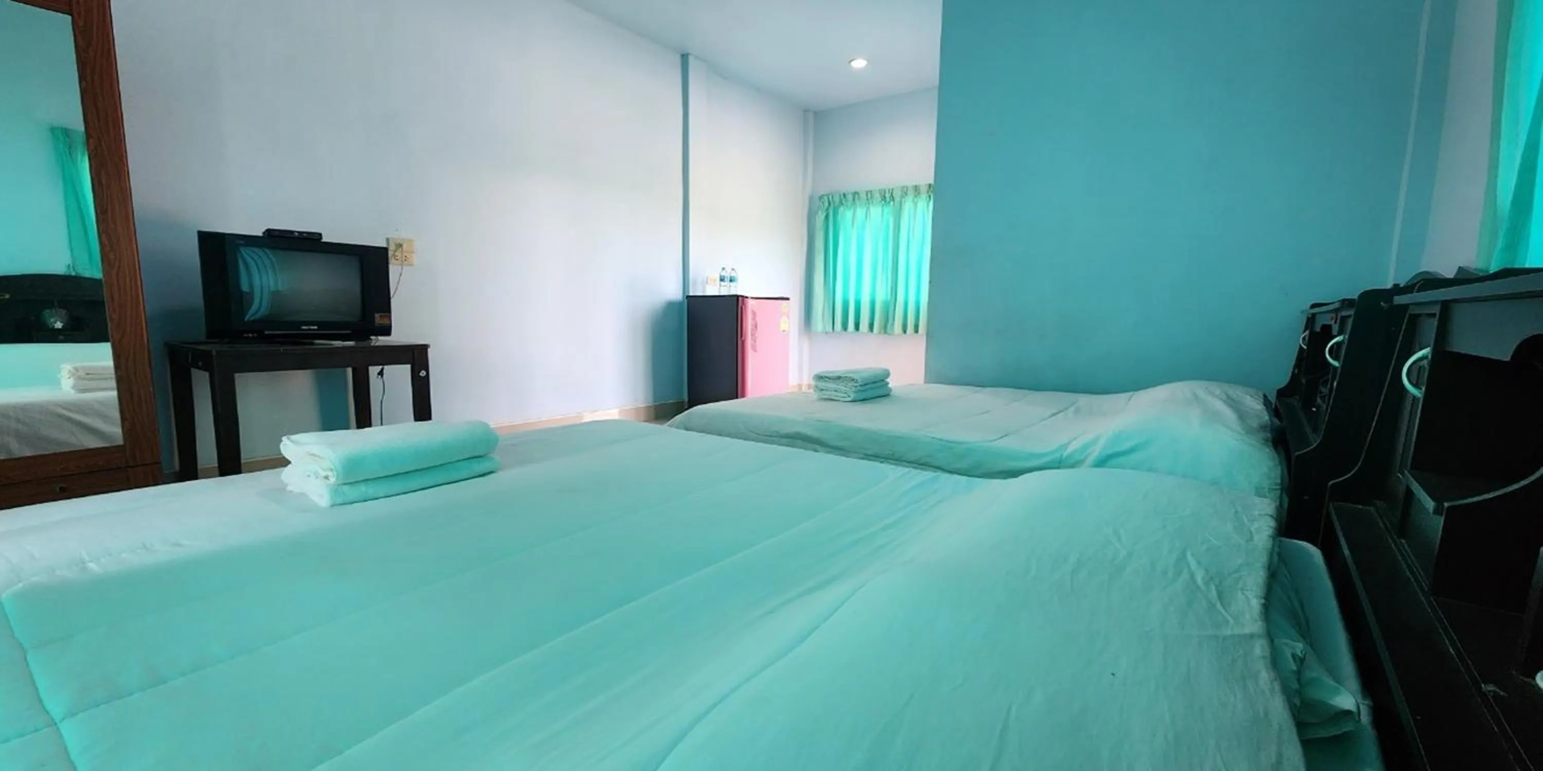 Bed in Chok Phikul Thong Resort