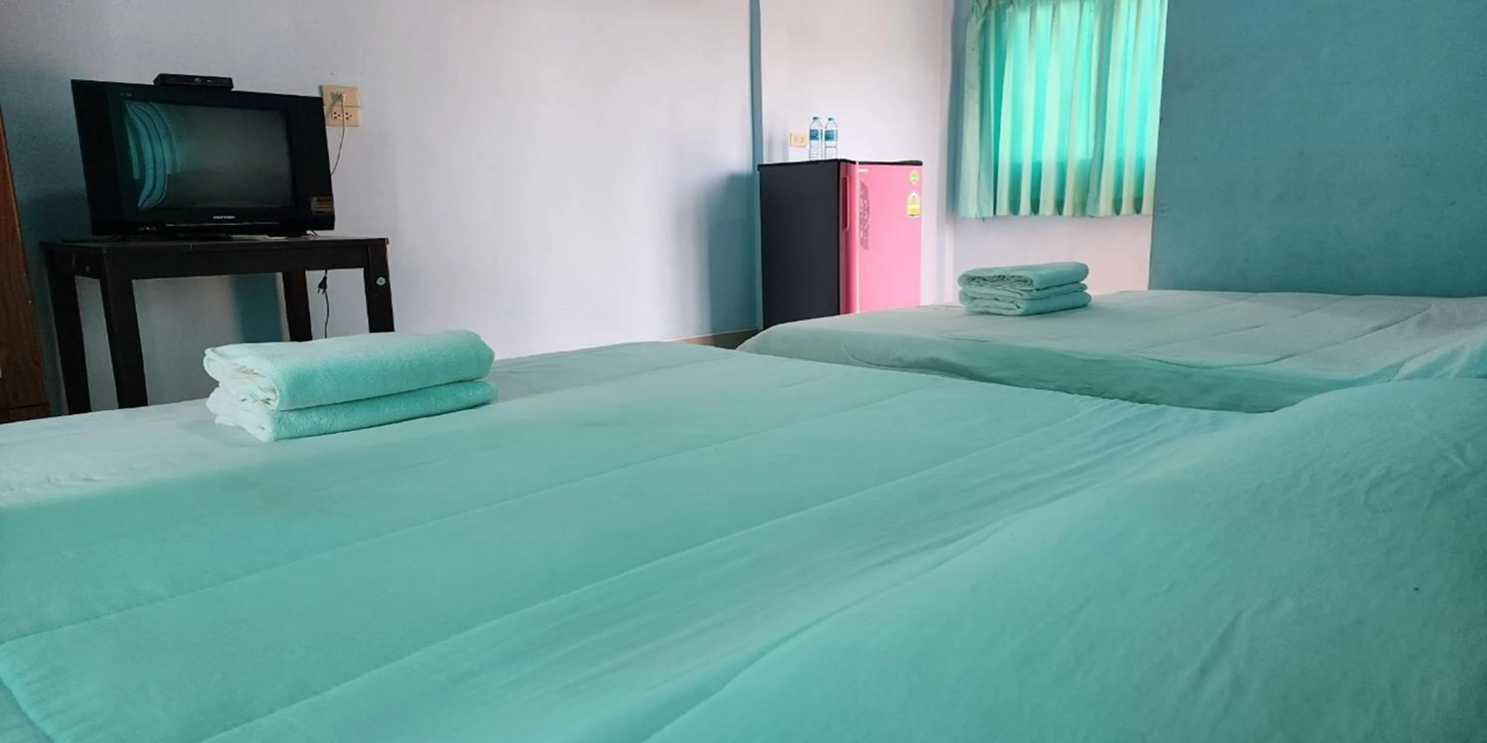 Bed in Chok Phikul Thong Resort