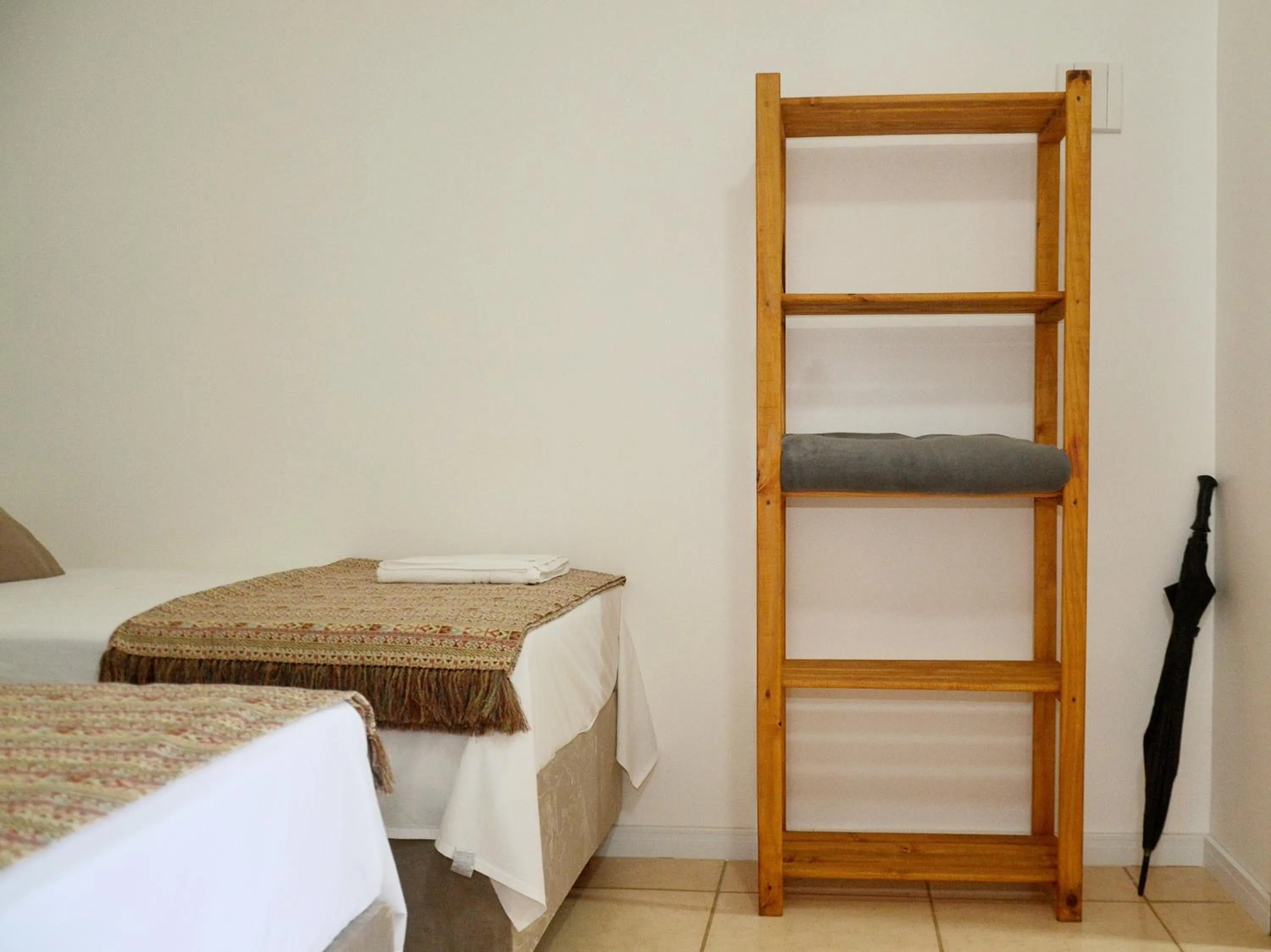 Photo of the whole room, Bed in Pousada la Boheme Guarda do Embaú - SC