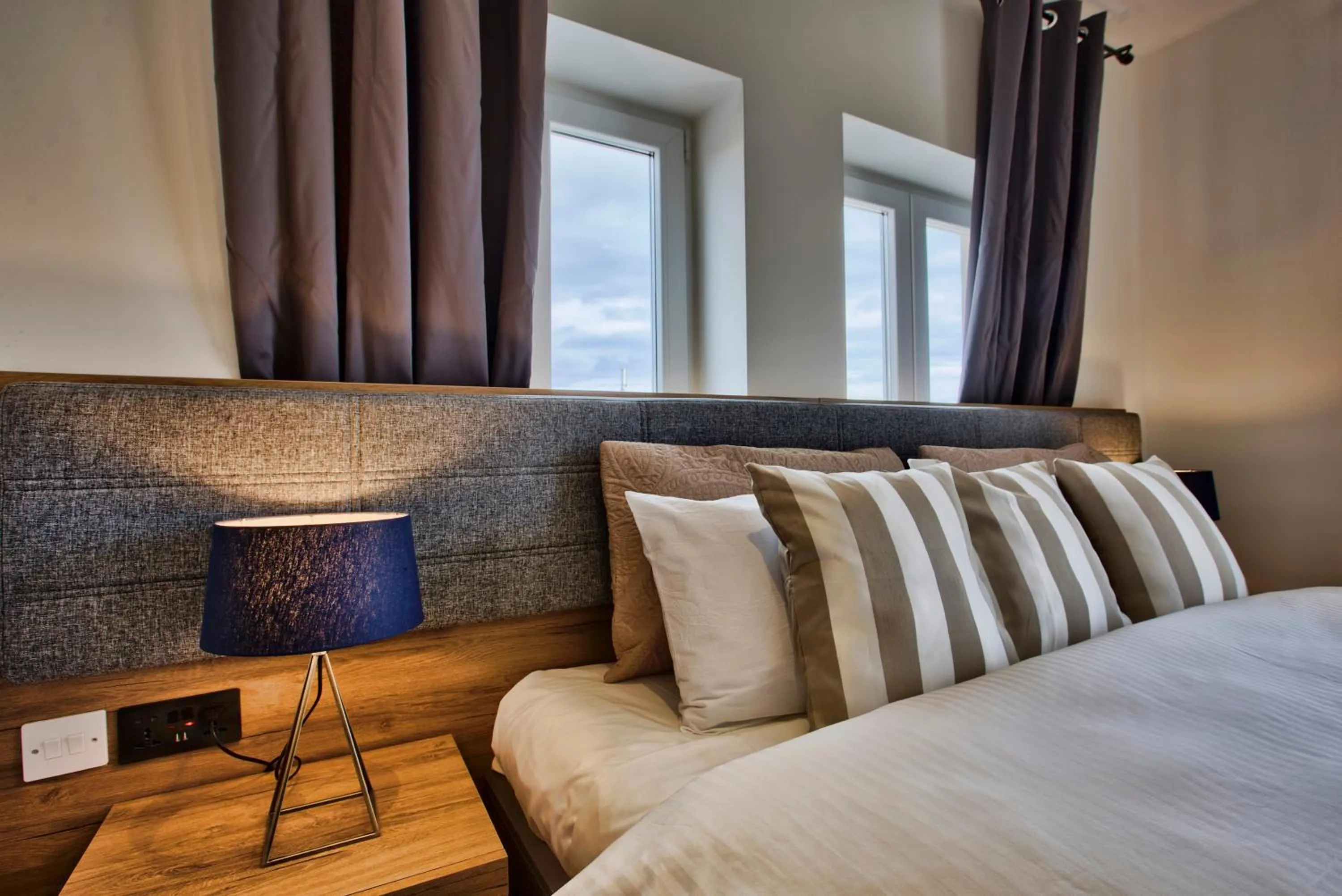 Bed in Tritoni Valletta Boutique Hotel