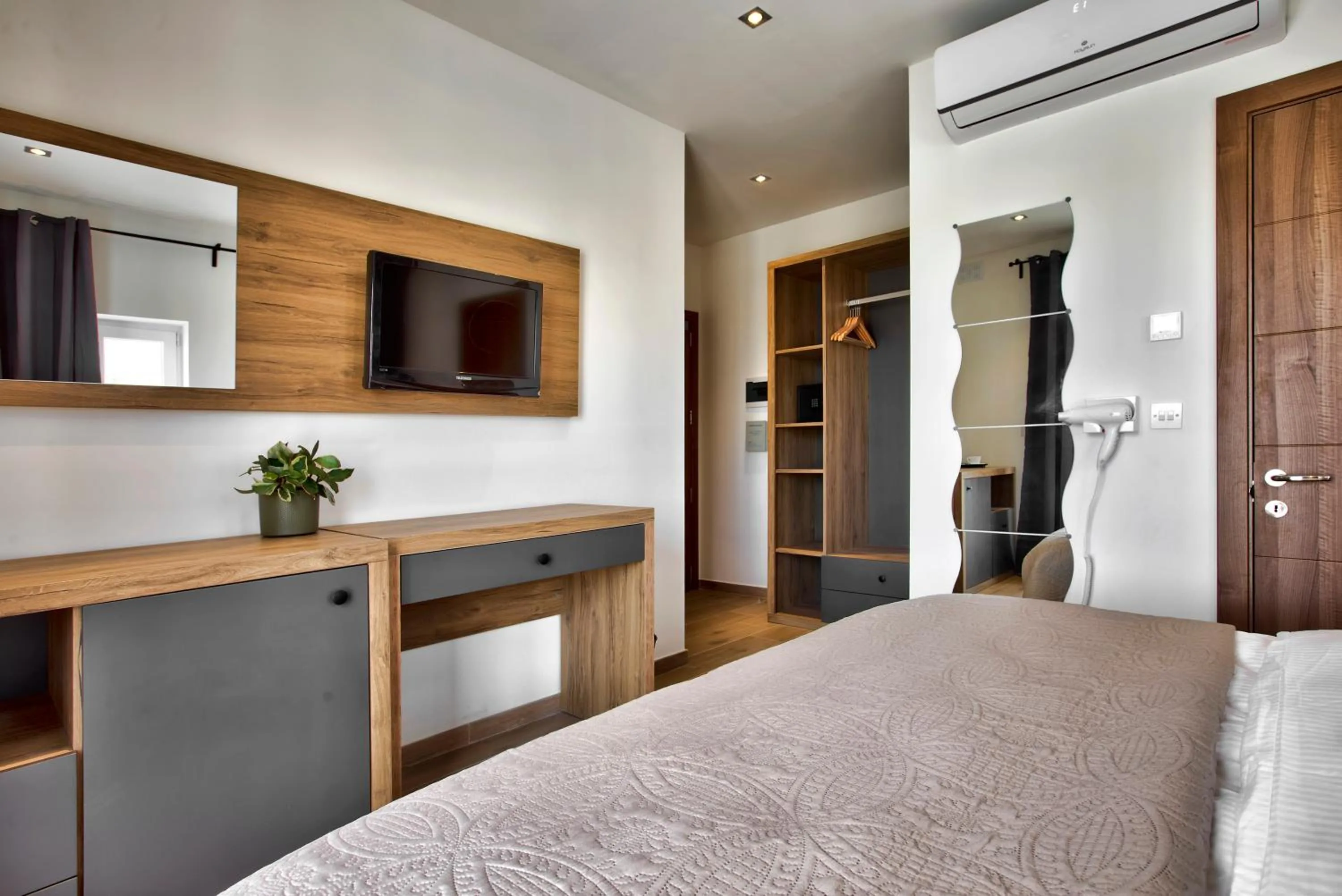 Bed in Tritoni Valletta Boutique Hotel