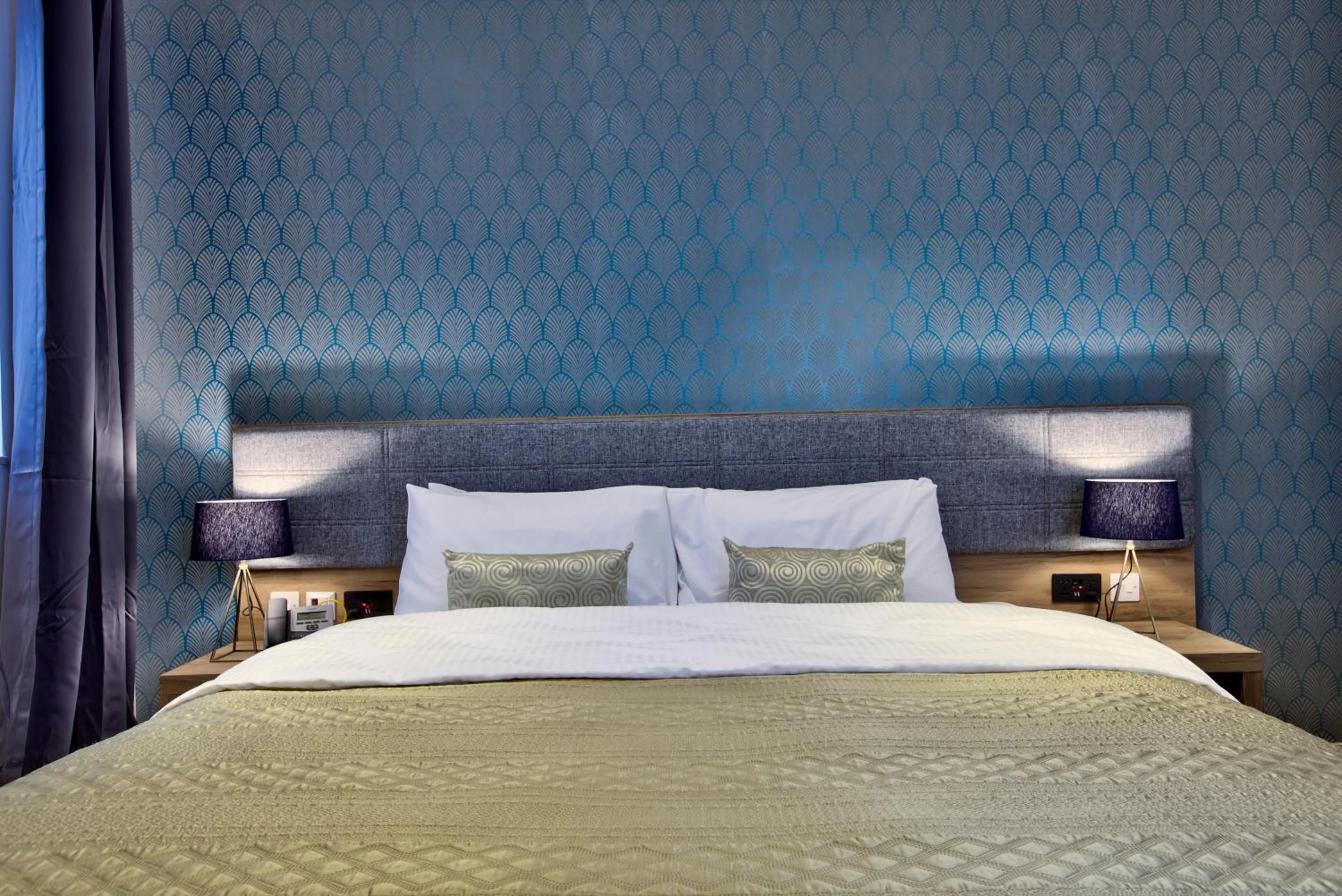 Bed in Tritoni Valletta Boutique Hotel