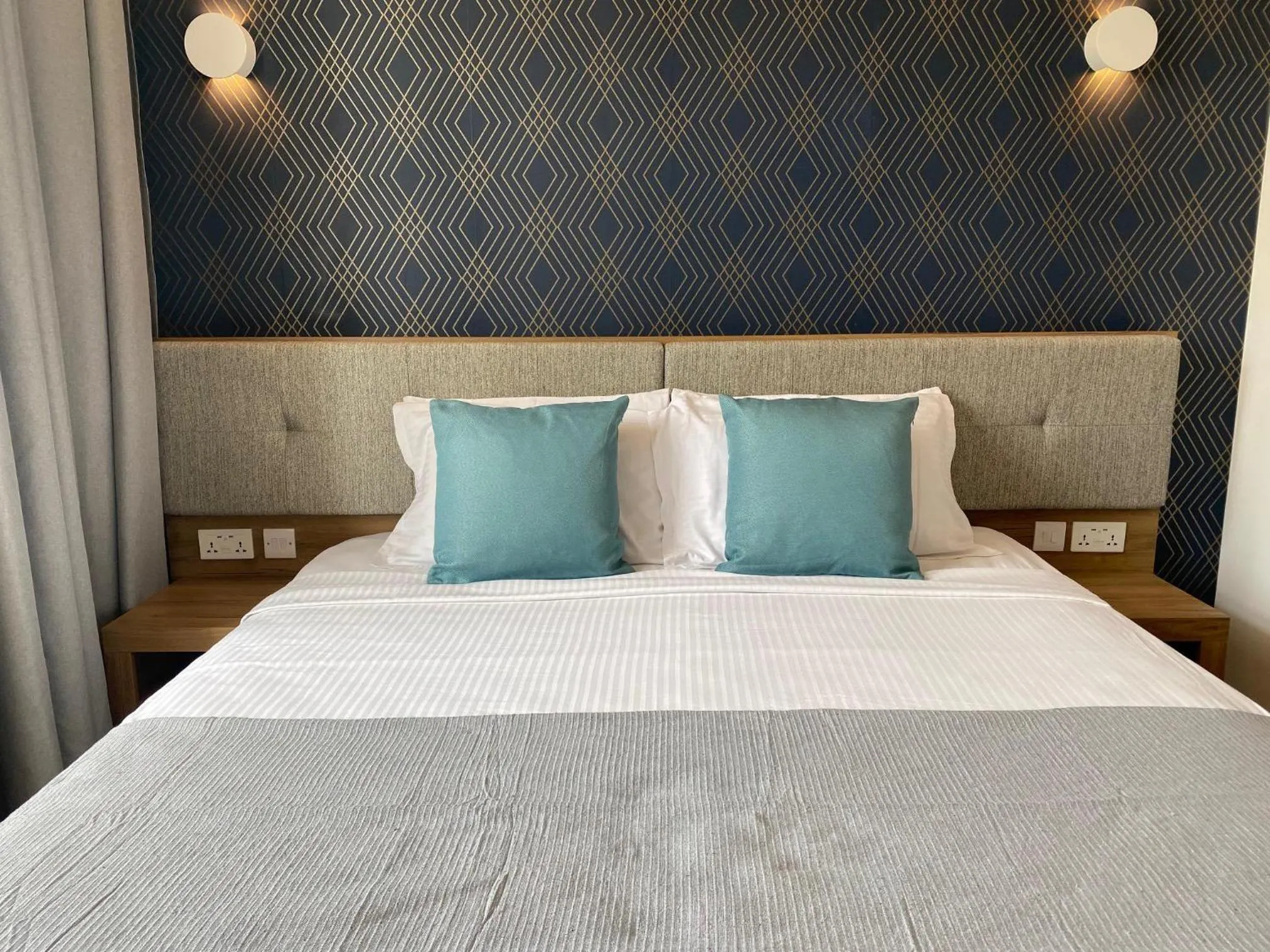 Bed in Tritoni Valletta Boutique Hotel