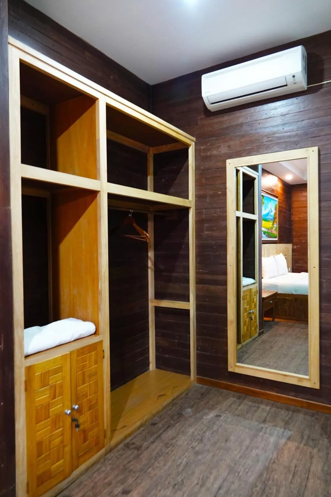 wardrobe, Bed in Baratha Hotel & Resto