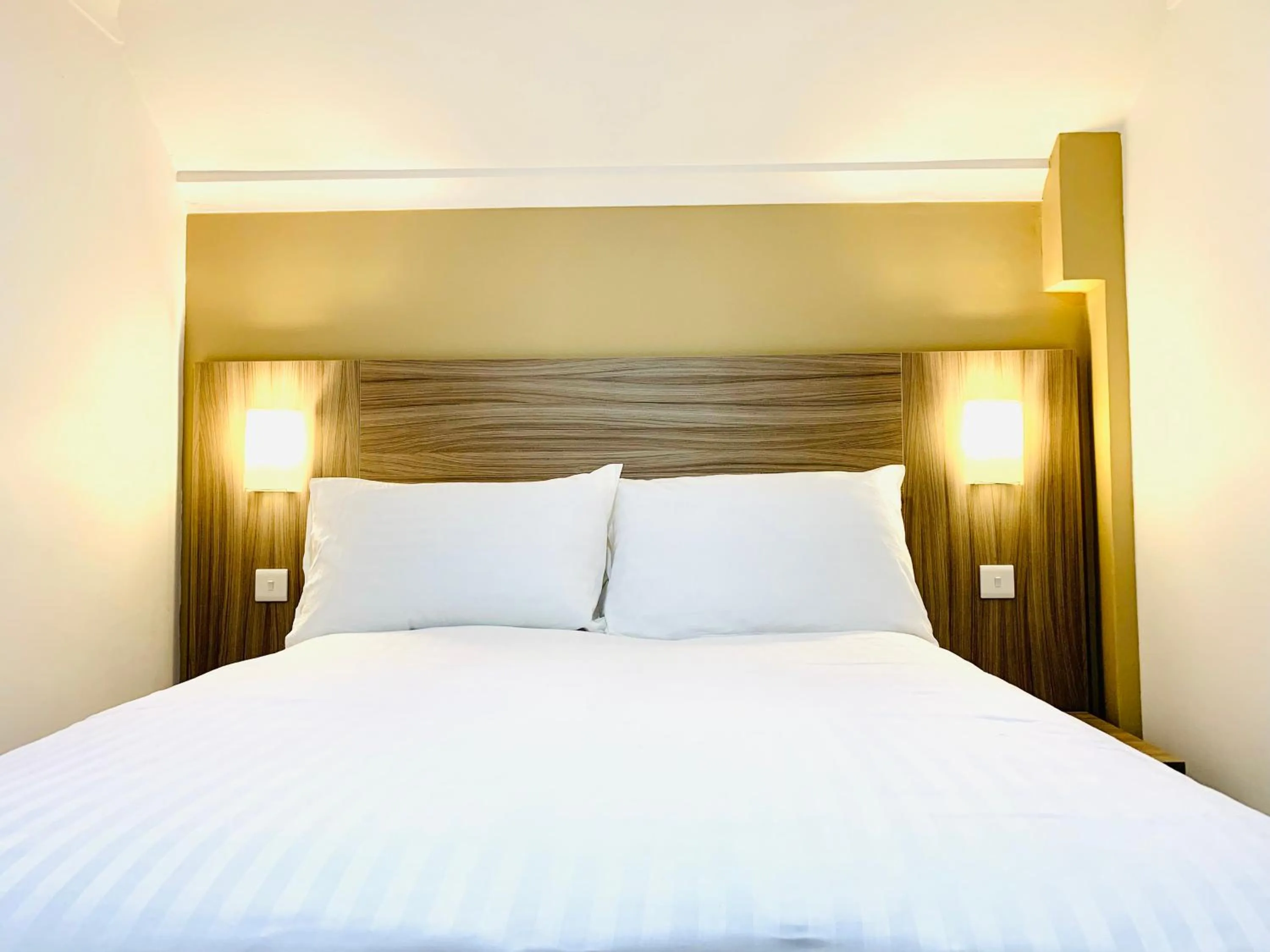 Bed in De Regency Style Hotel