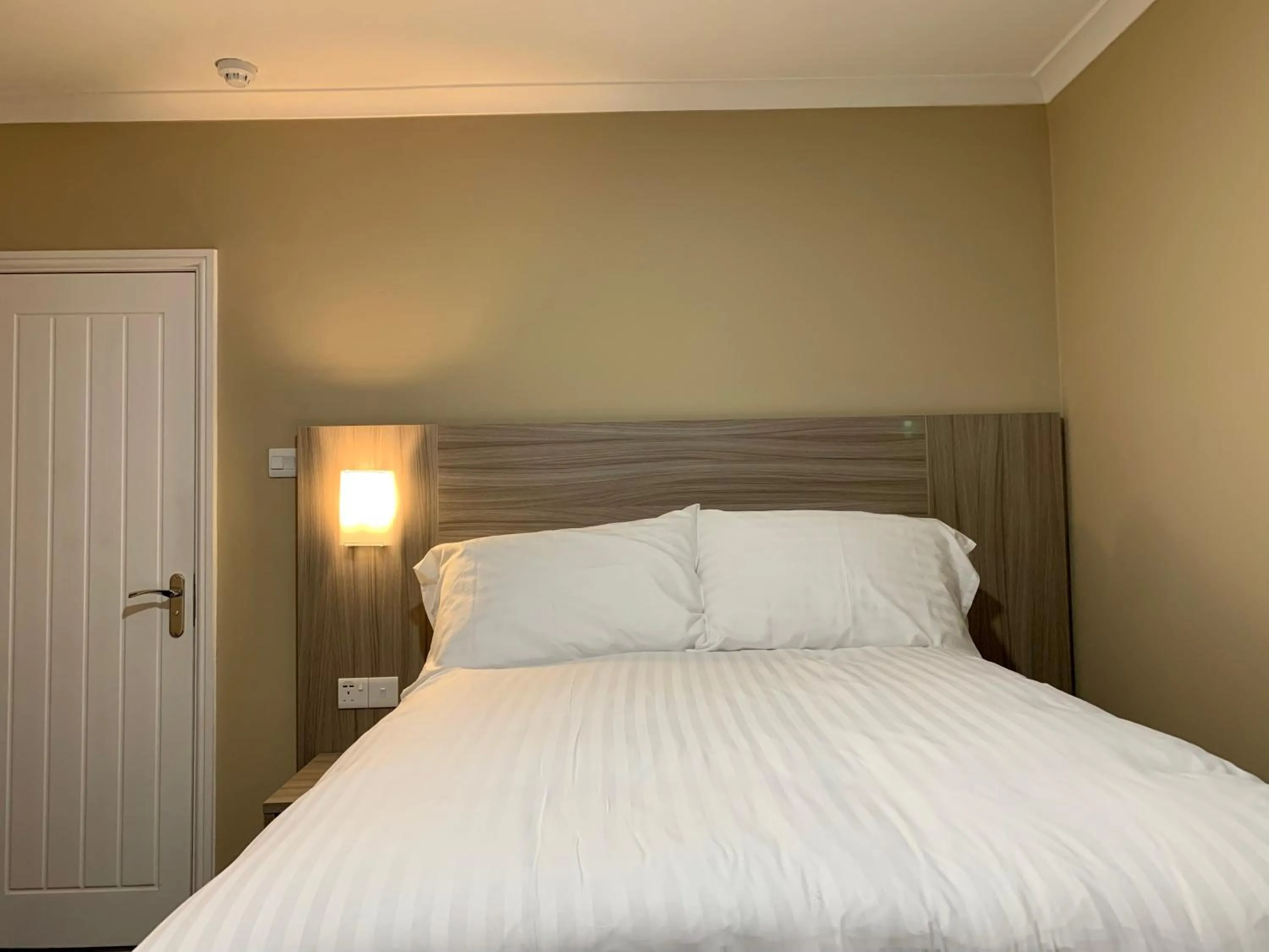 Bed in De Regency Style Hotel