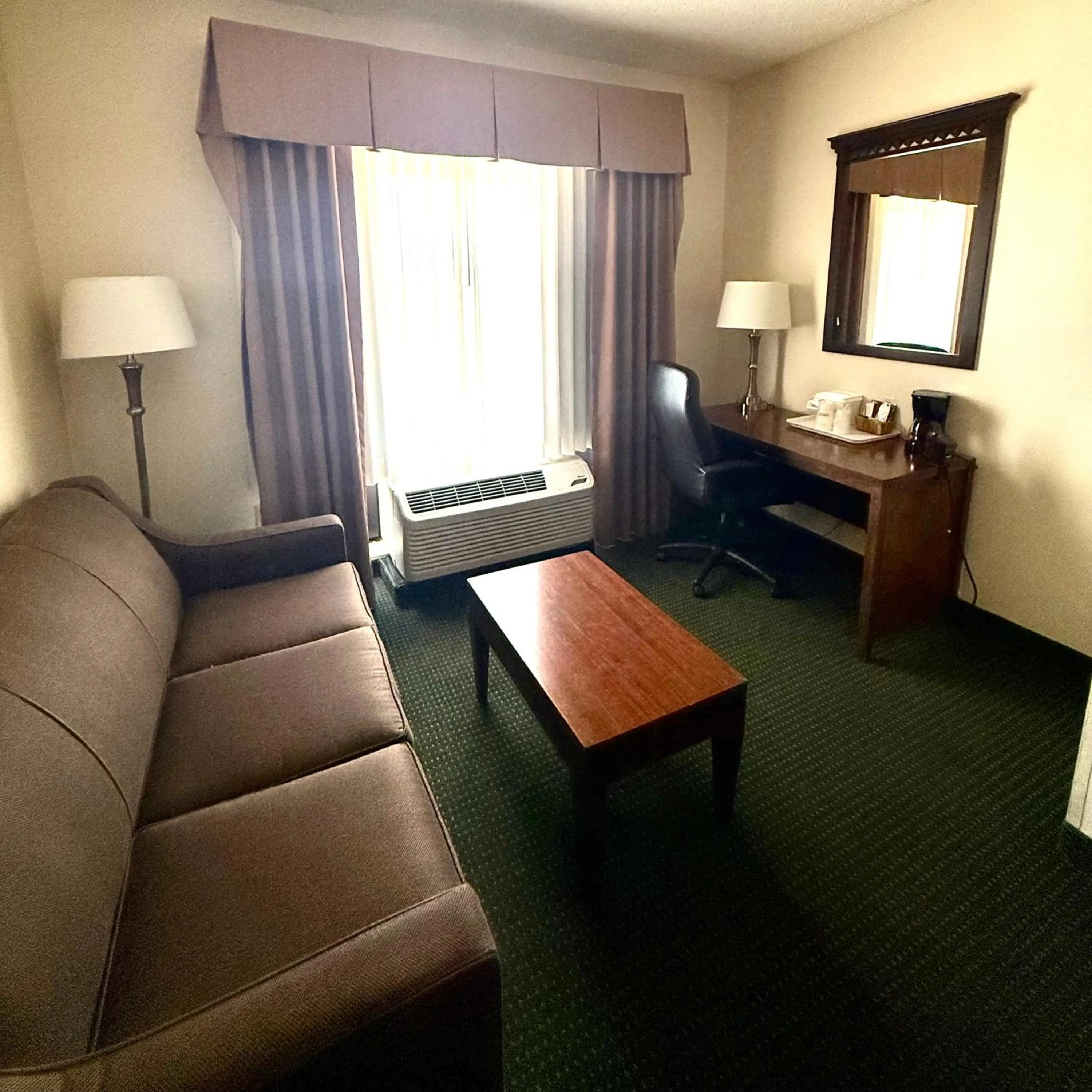 Seating area in Ramada by Wyndham Denver International Airport