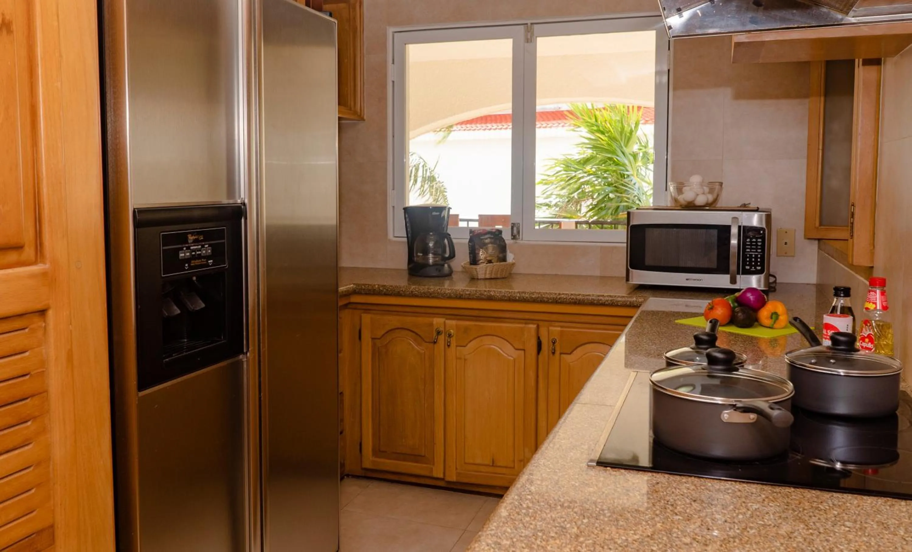 Kitchen or kitchenette in Oceanfront condo at voted best Cancun sandy beach