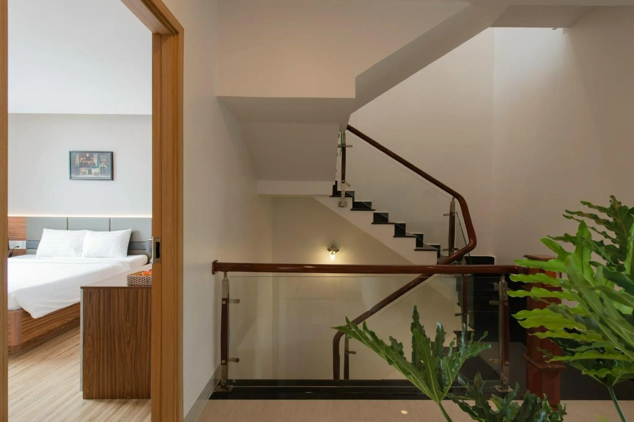 Communal lounge/ TV room, Bed in West Lake Hotel - Near Bai Dai Beach