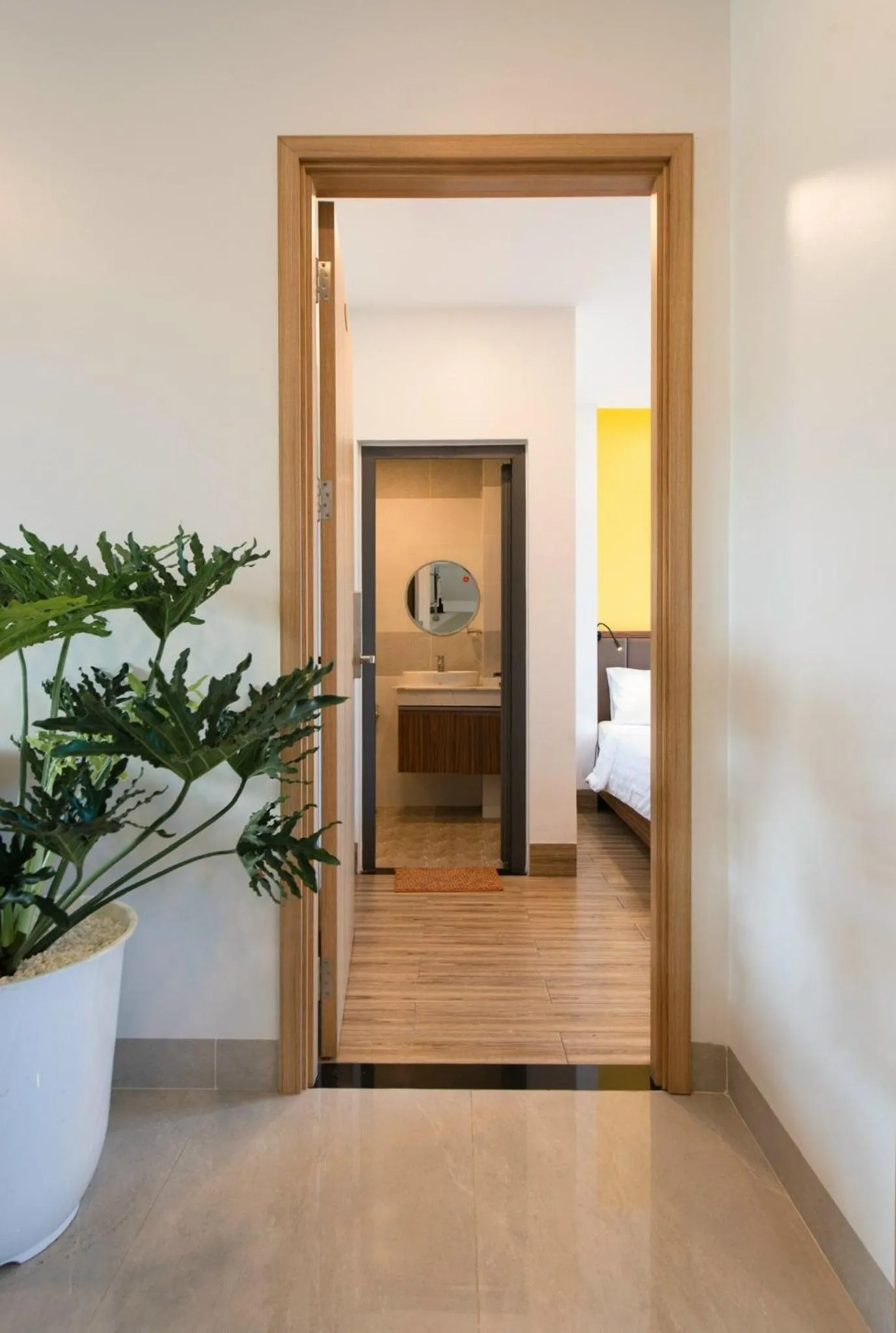 Bathroom, Bed in West Lake Hotel - Near Bai Dai Beach