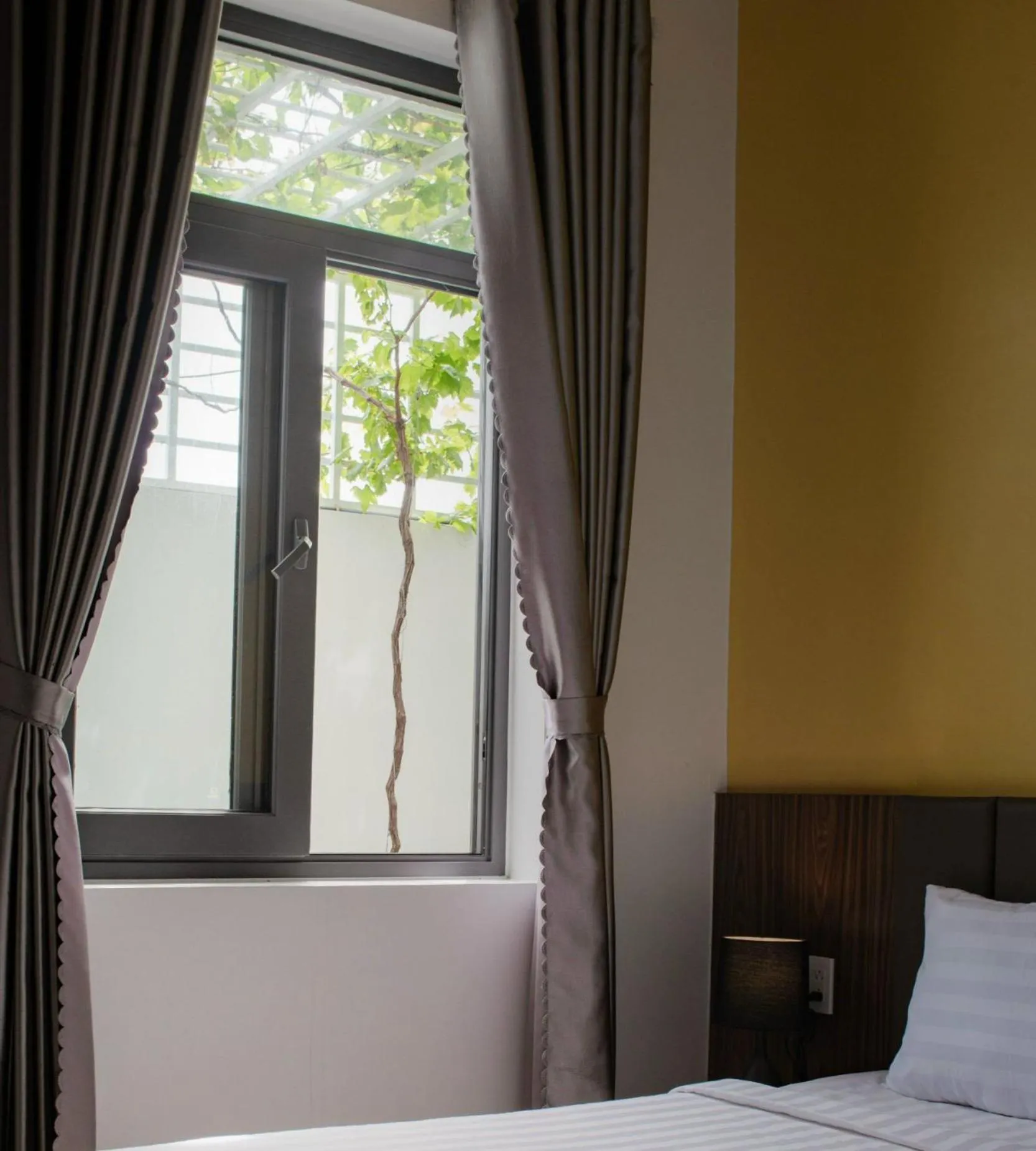 Bedroom, Bed in West Lake Hotel - Near Bai Dai Beach