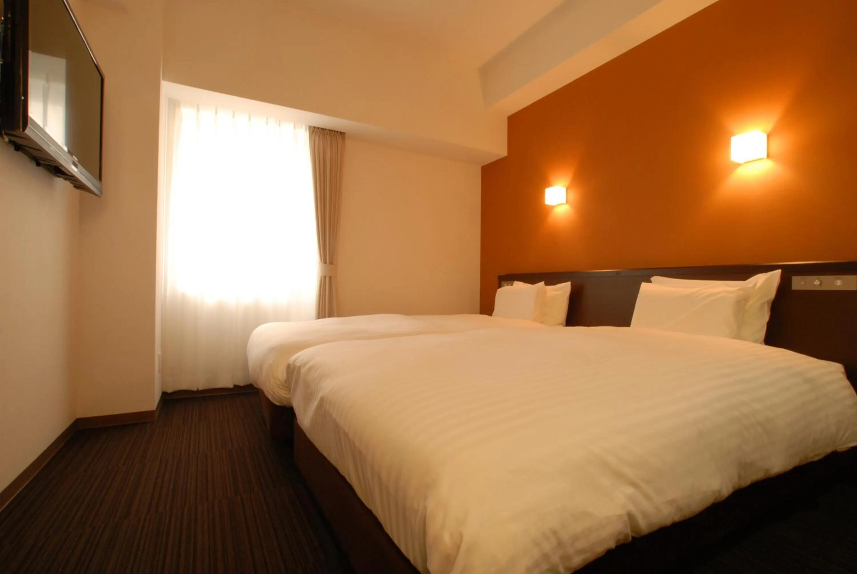 Bed in AB Hotel Nagoya Sakae