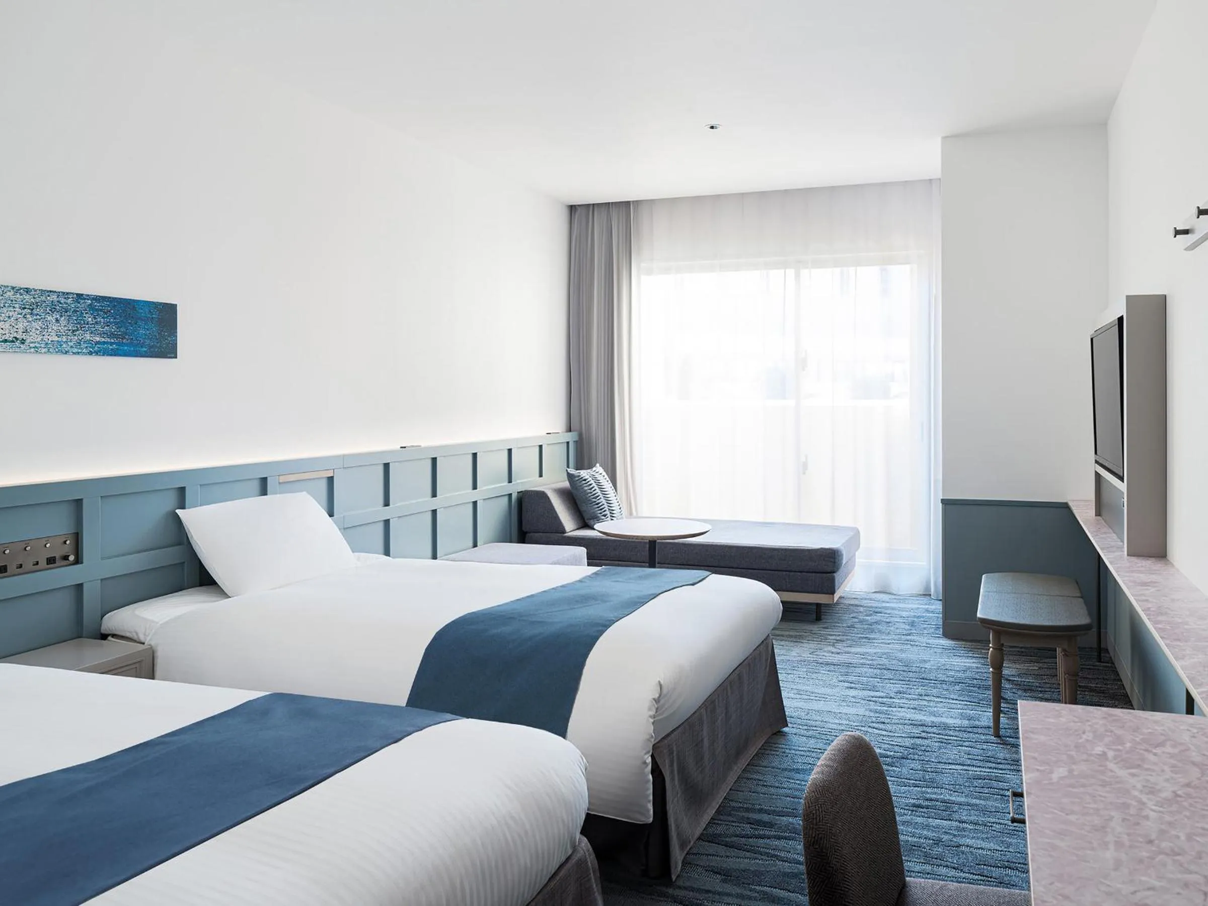 Bed in Lequ Okinawa Chatan Spa ＆ Resort