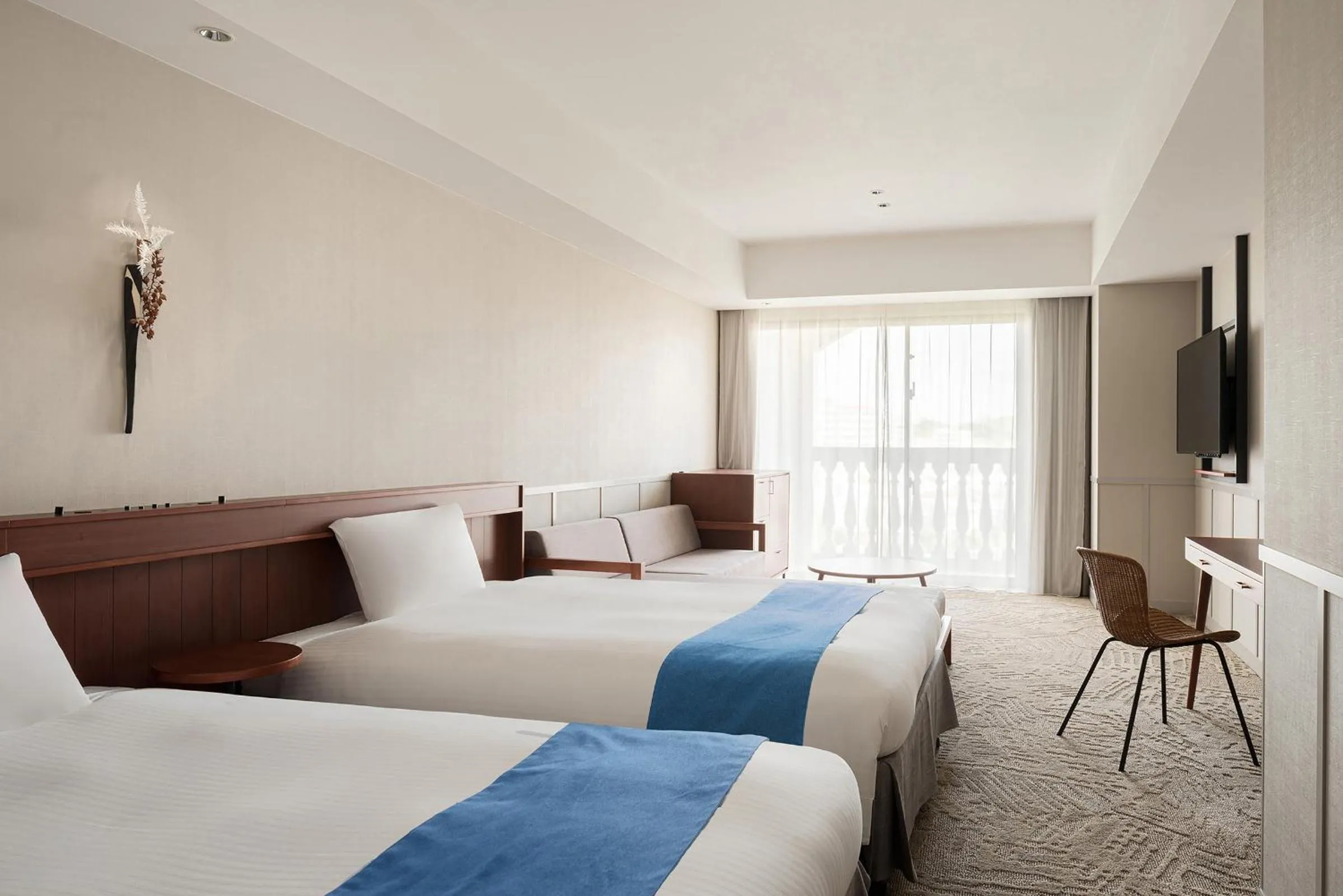 Bed in Lequ Okinawa Chatan Spa ＆ Resort