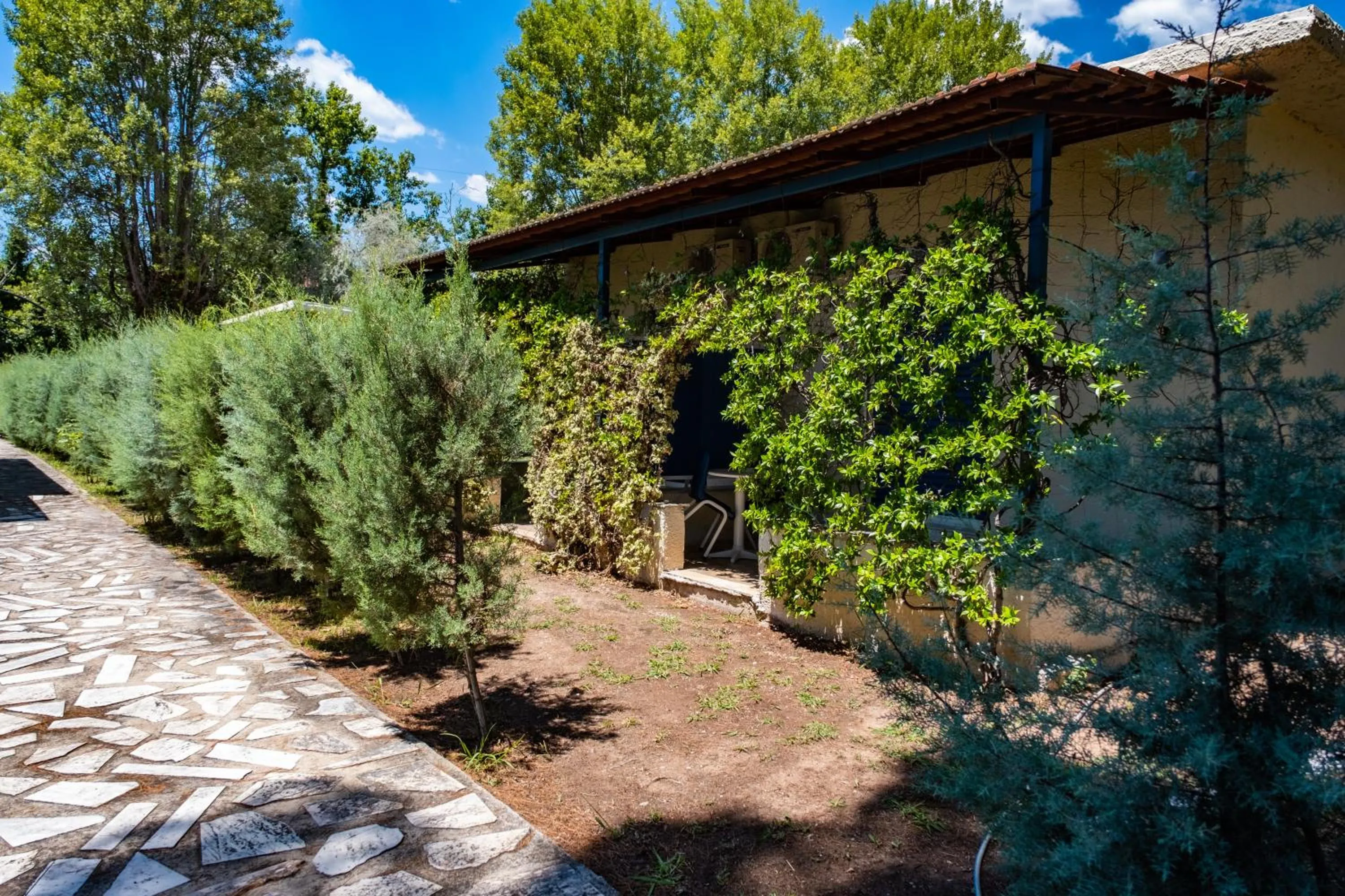 Property building in Tsamadanis Hotel & Bungalows Friends Family