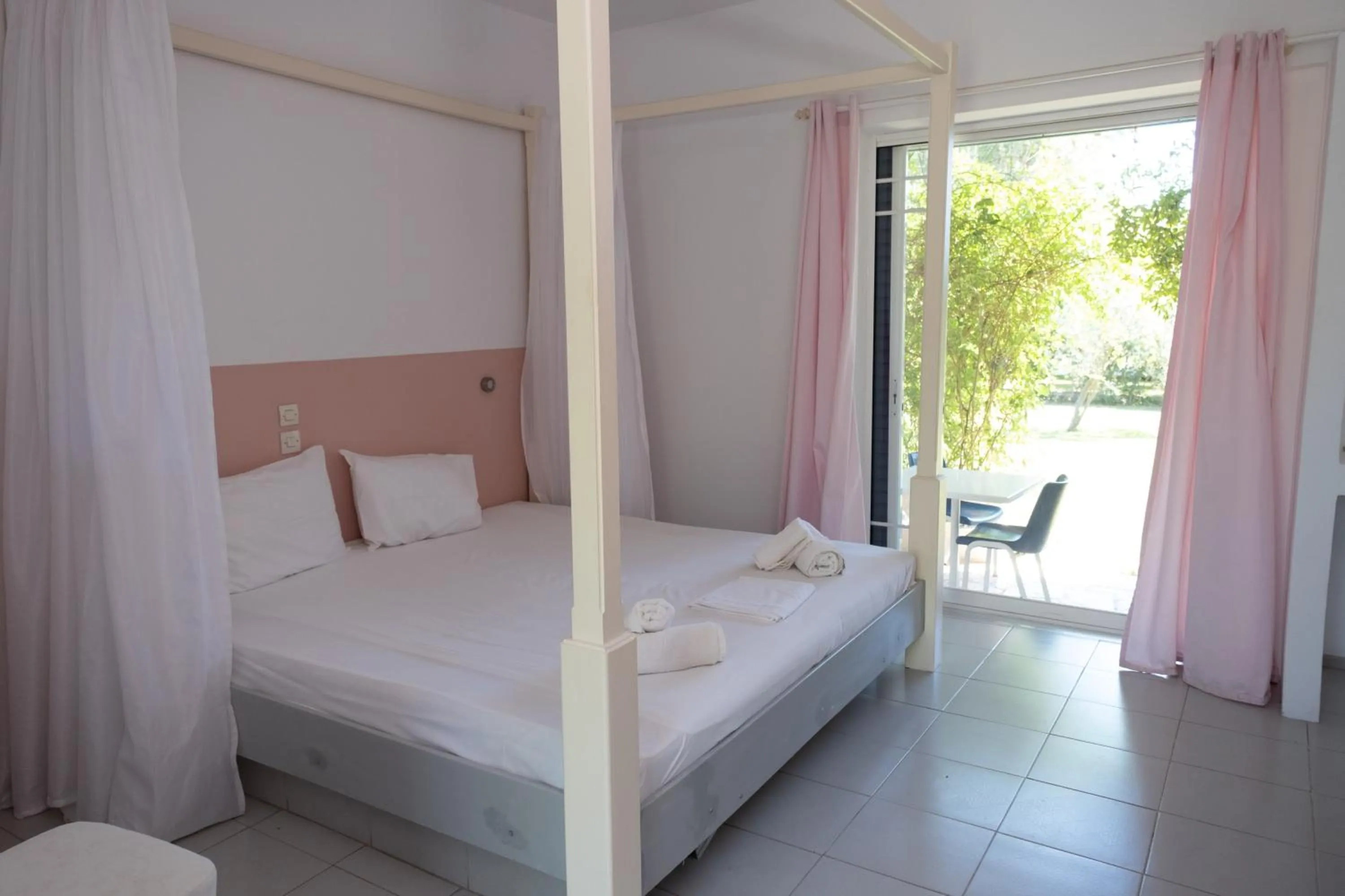 Bedroom, Bed in Tsamadanis Hotel & Bungalows Friends Family