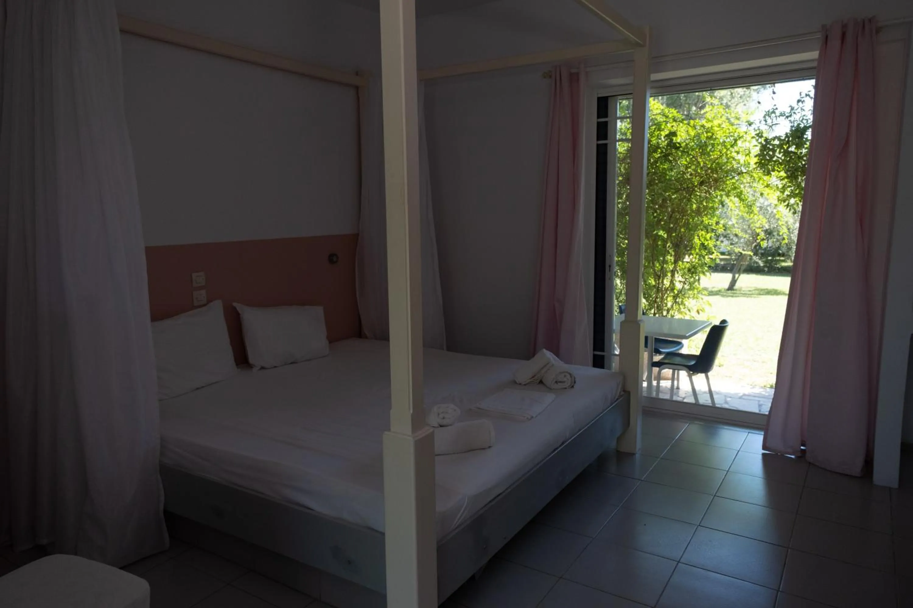 Bedroom, Bed in Tsamadanis Hotel & Bungalows Friends Family