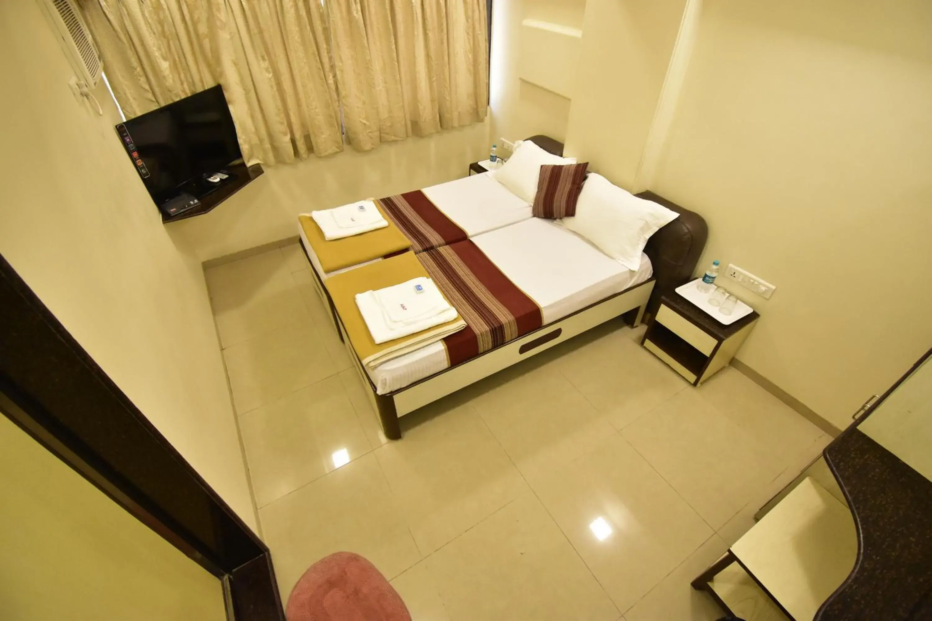 Budget Double or Twin Room - single occupancy in Hotel Kalpana Palace, Mumbai Budget Double or Twin Room - single occupancy in Hotel Kalpana Palace, Mumbai