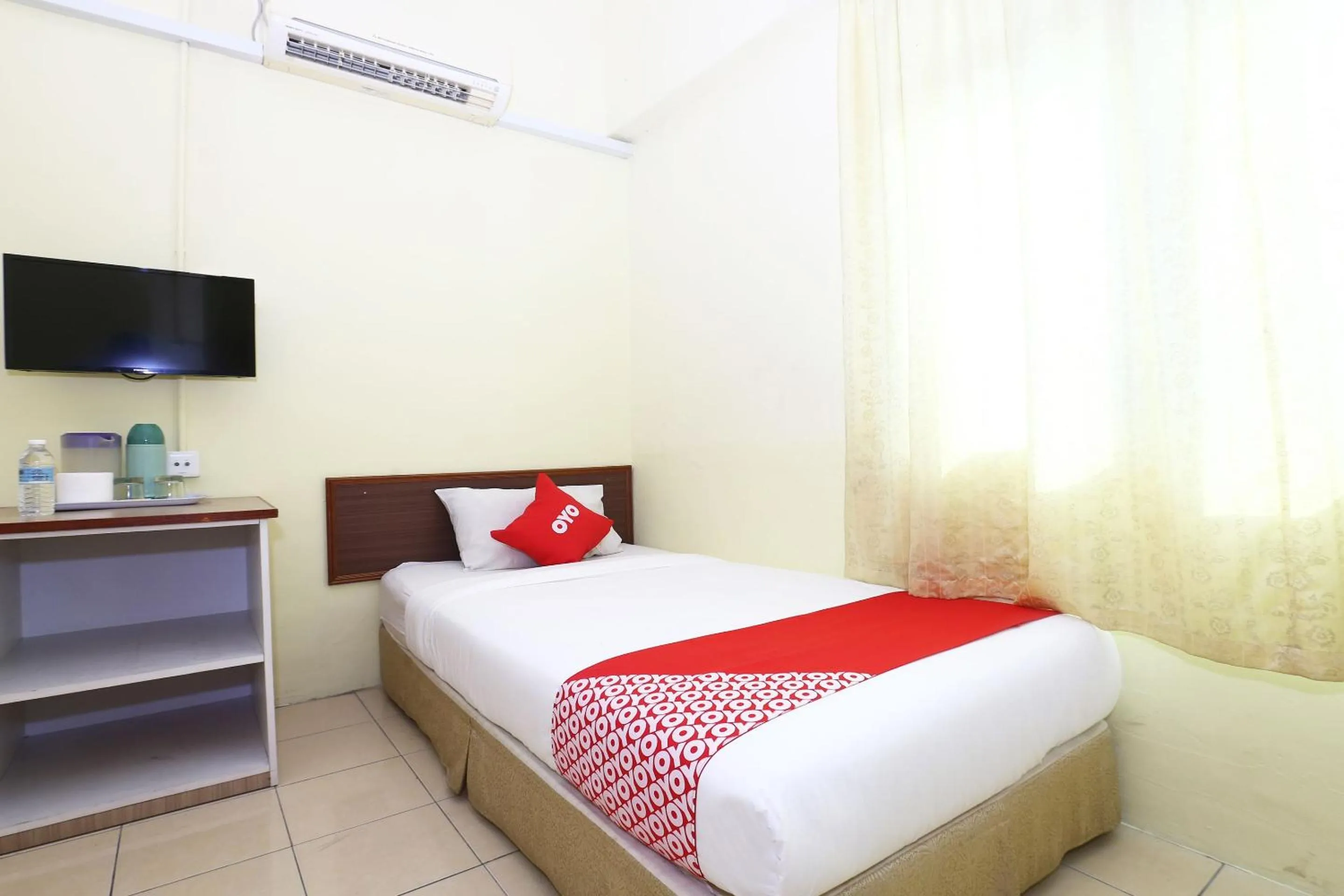 Bedroom in Hotel O Harmoni Hotel