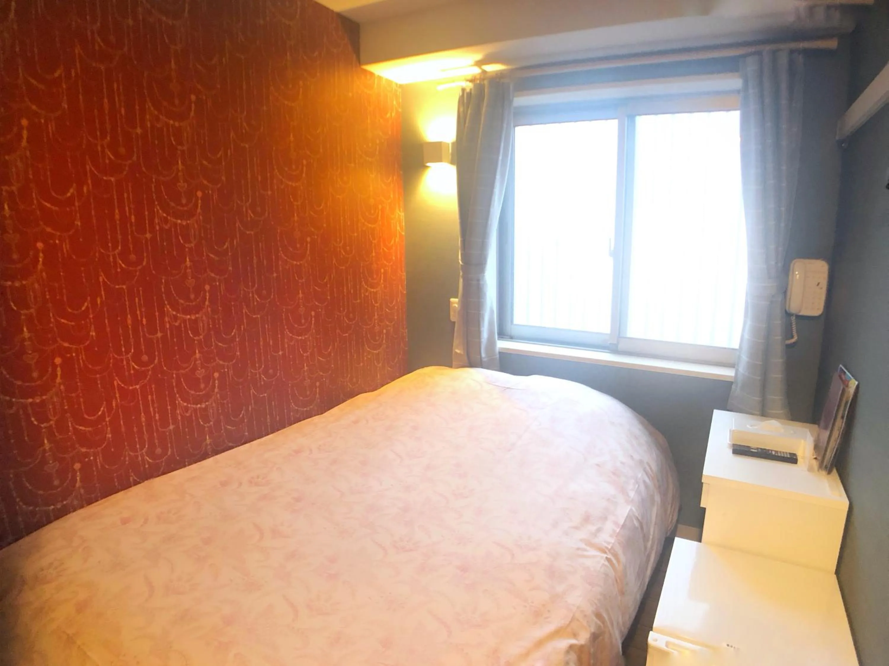 Bed in Tokyo Tourist Inn