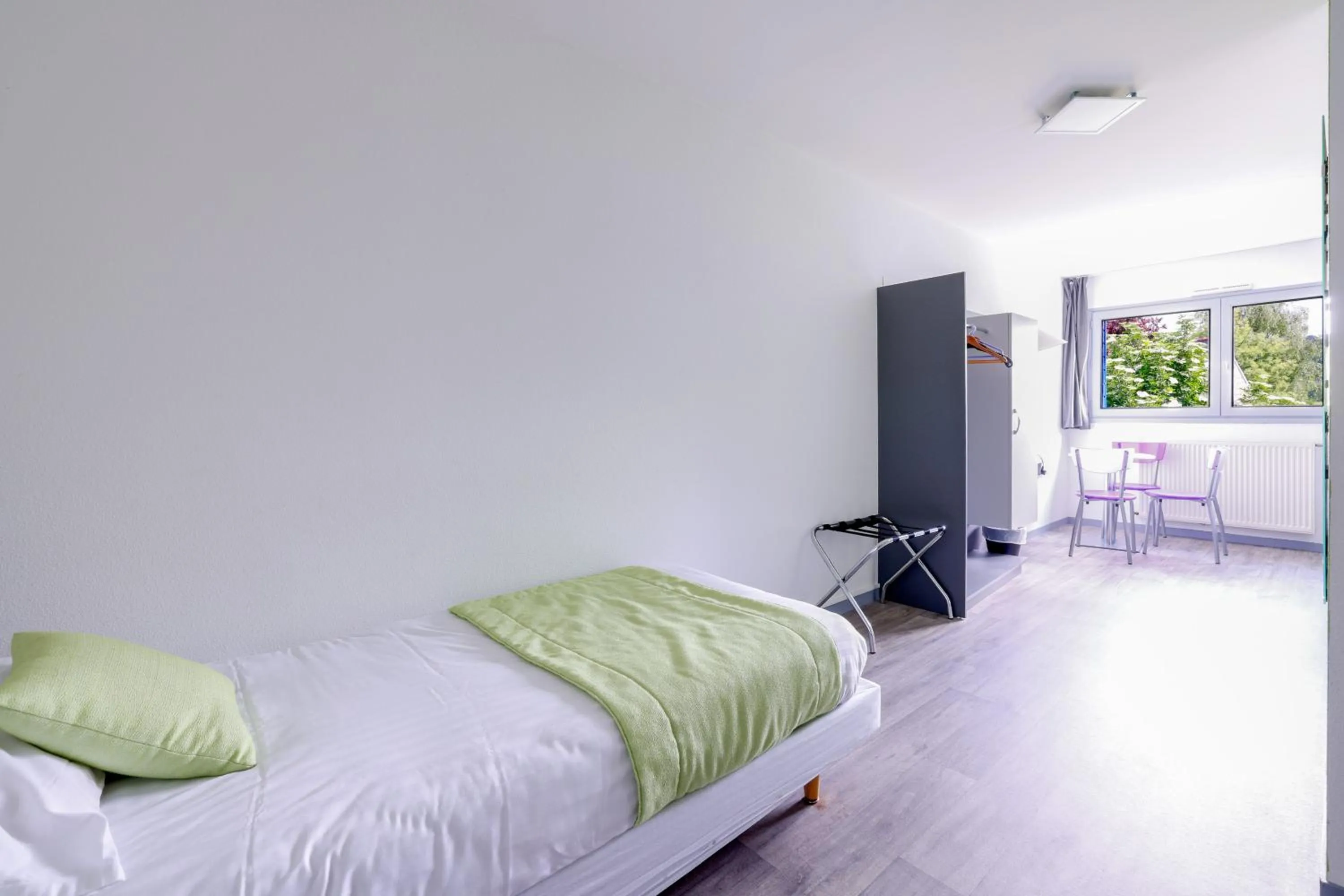 Bed in Hôtel de la baie de Paimpol