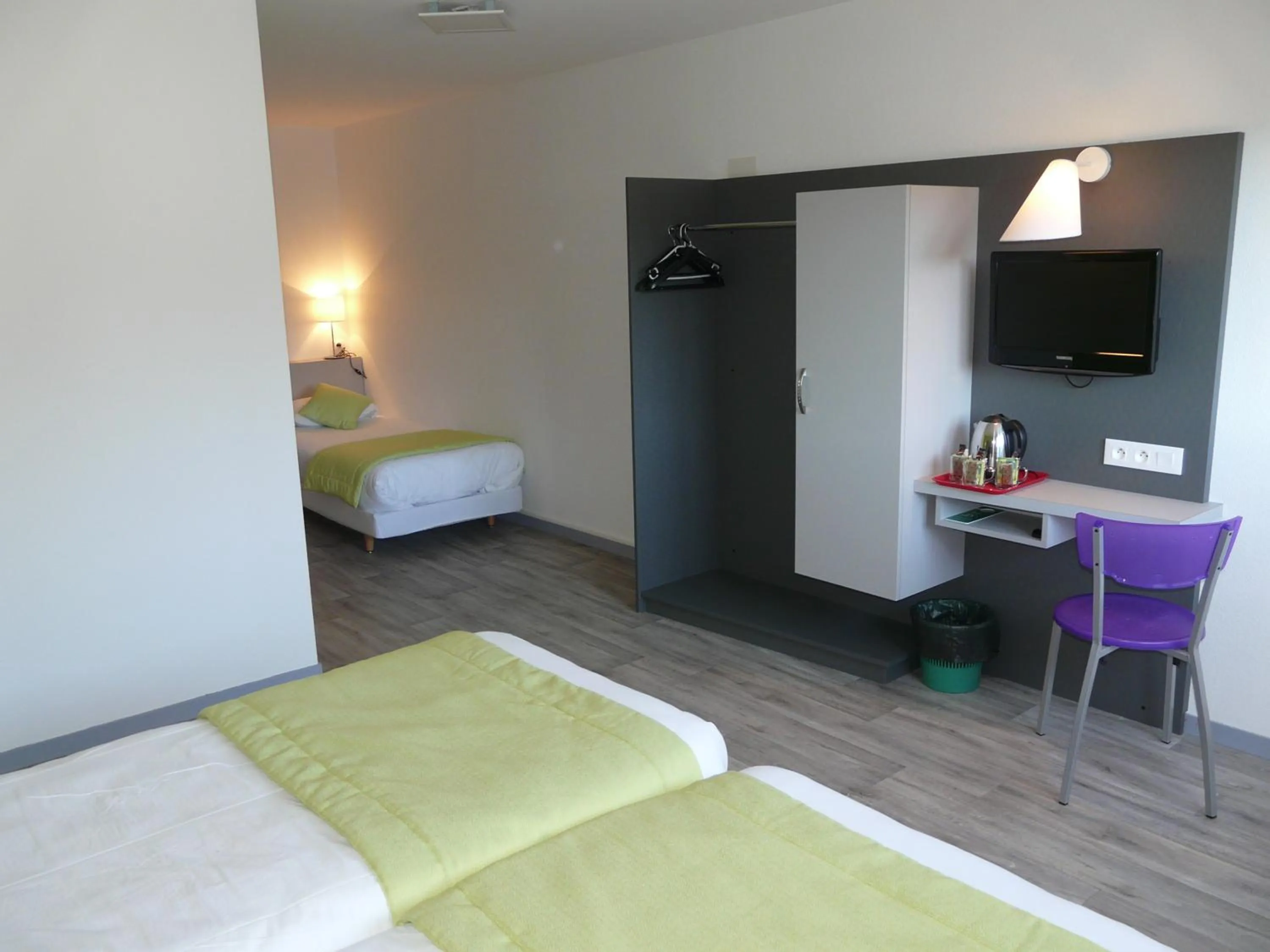 Bed in Hôtel de la baie de Paimpol