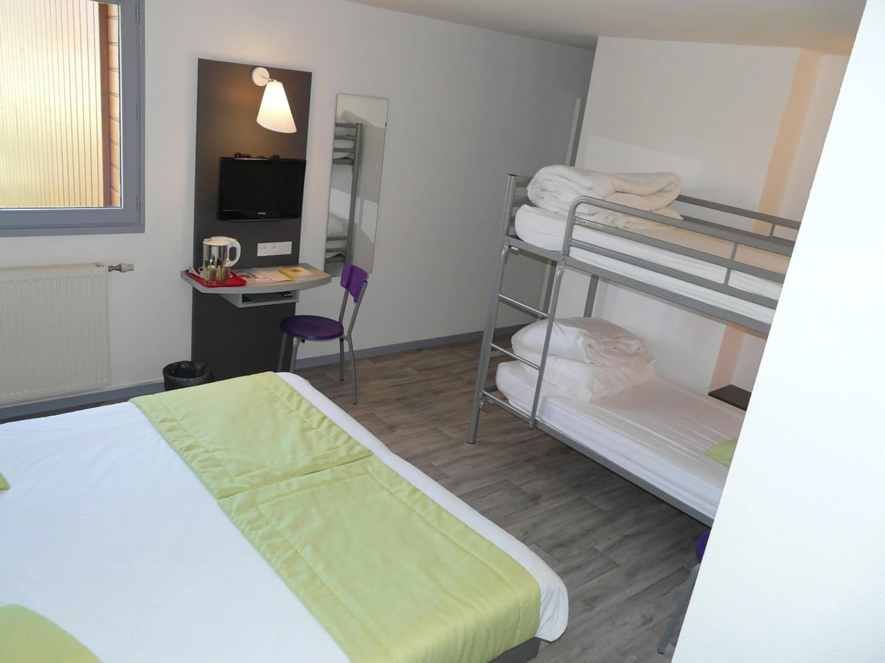 Bed in Hôtel de la baie de Paimpol