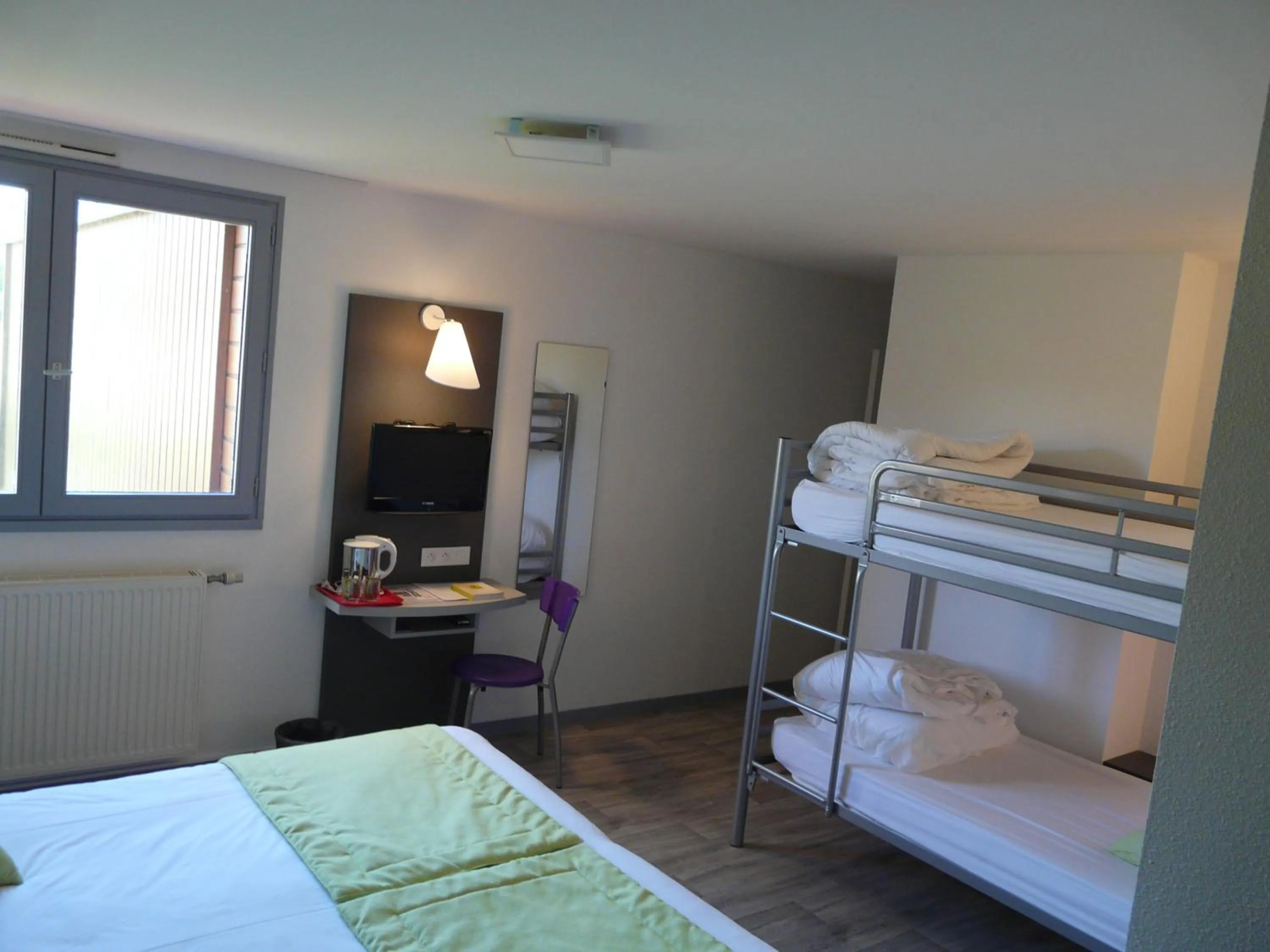 Bed in Hôtel de la baie de Paimpol