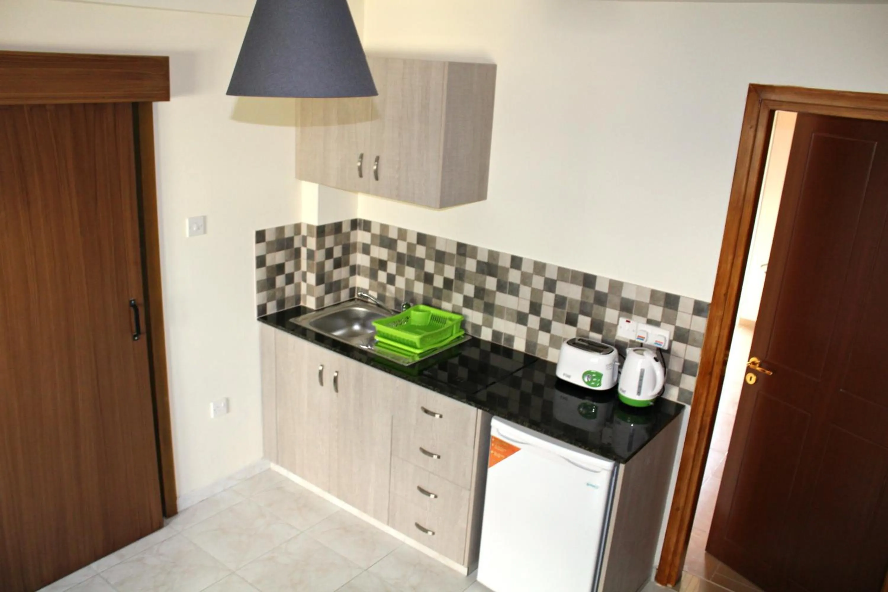 Kitchen or kitchenette in Maria Zintili Apartments