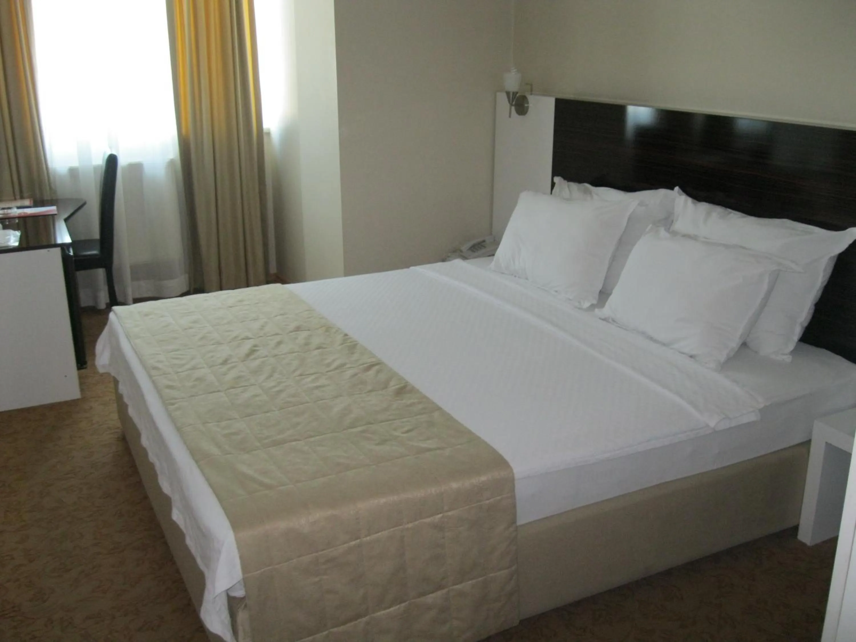 Bed in Anya Suit Otel