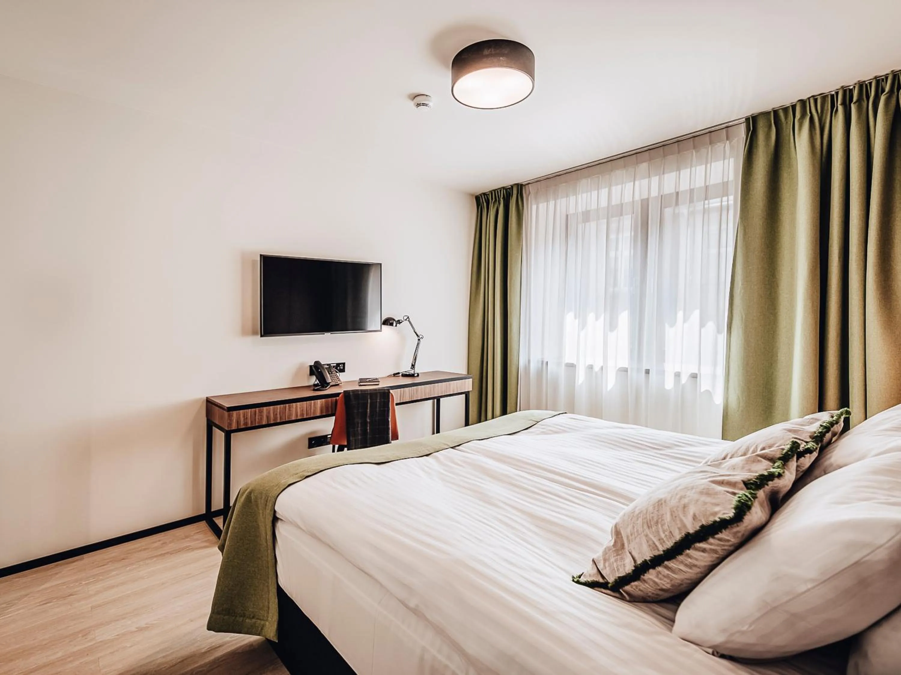 TV and multimedia, Bed in Apartamenty Sowa Bydgoszcz