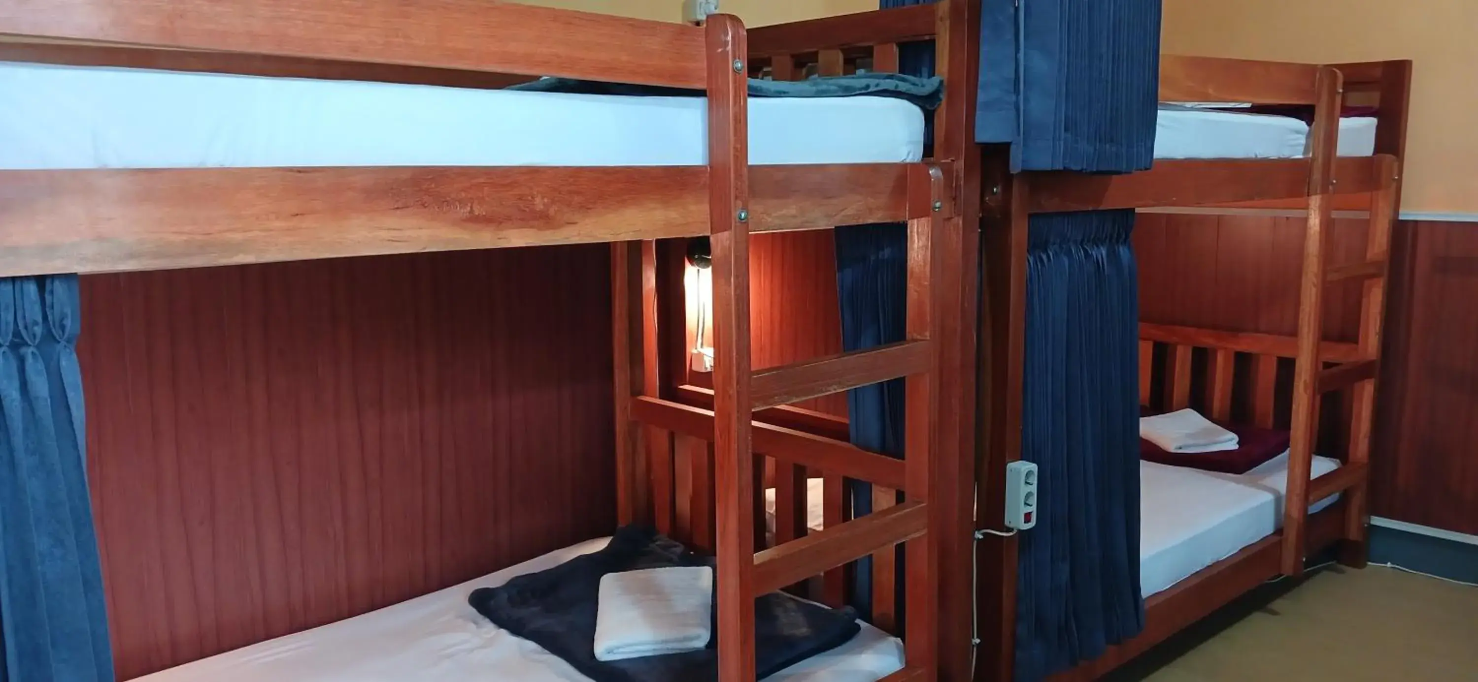 Bed in 4-Bed Mixed Dormitory Room in Dewi Sri Guesthouse Bed in 4-Bed Mixed Dormitory Room in Dewi Sri Guesthouse