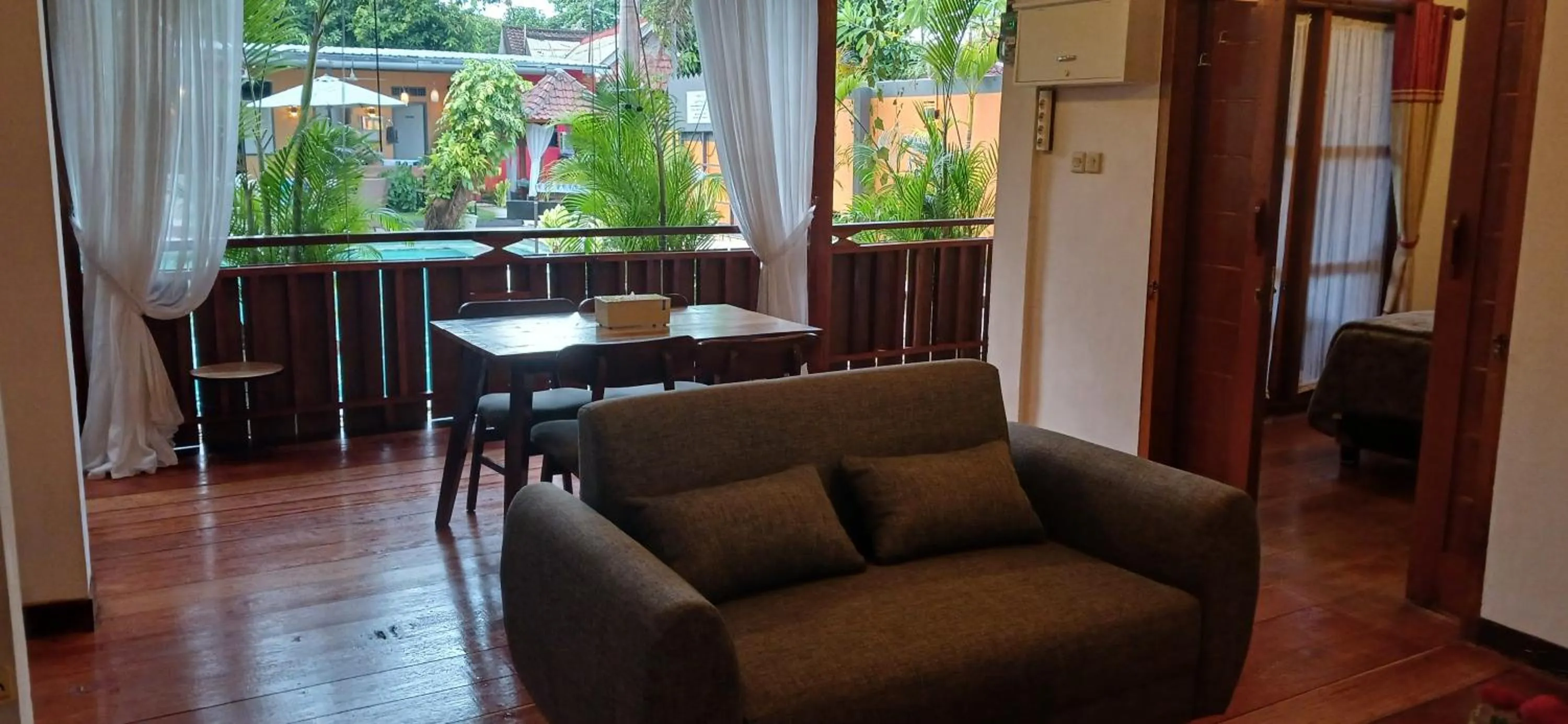 Living room in Dewi Sri Guesthouse