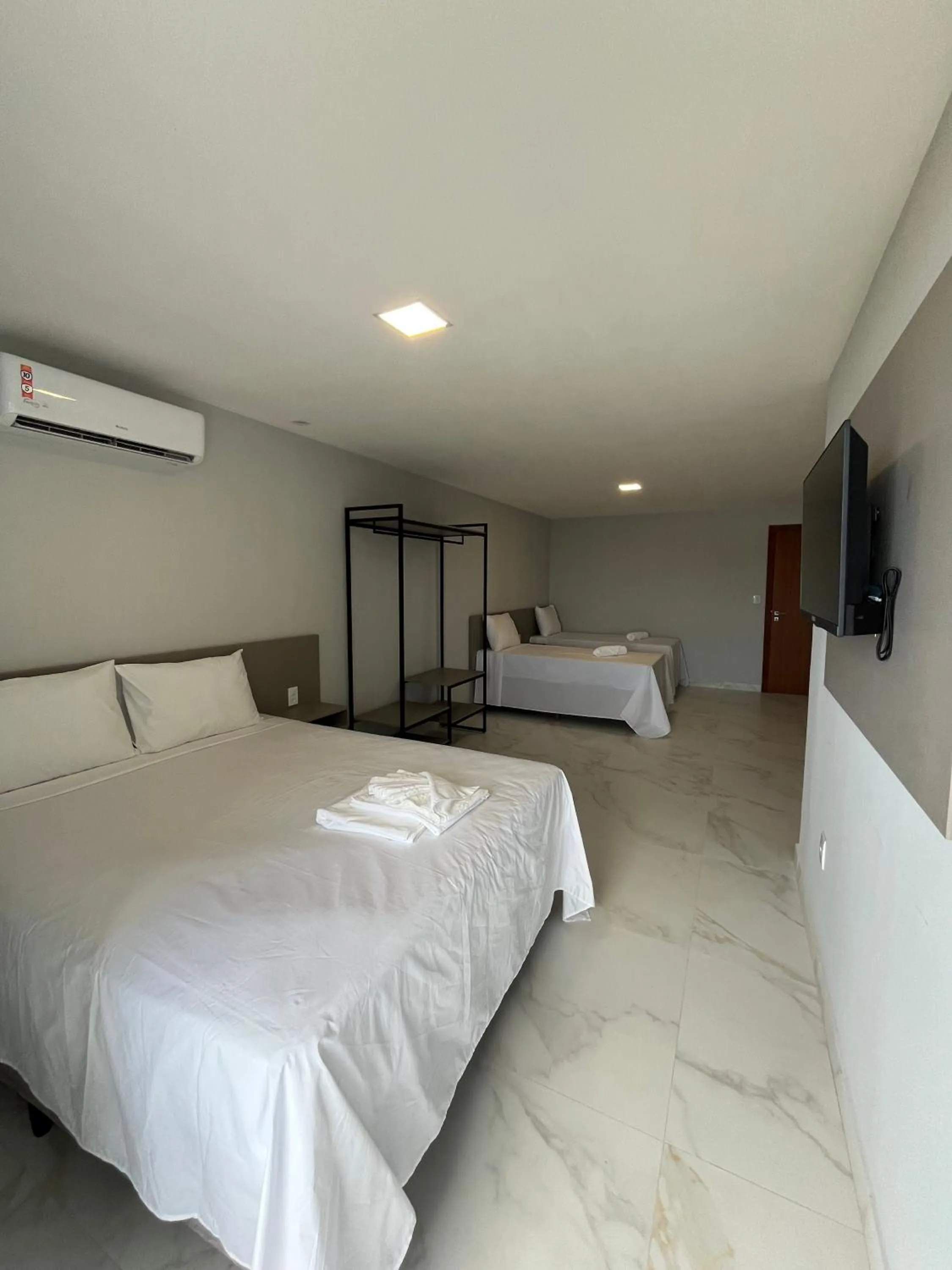 Bed in Piúma Palace Hotel