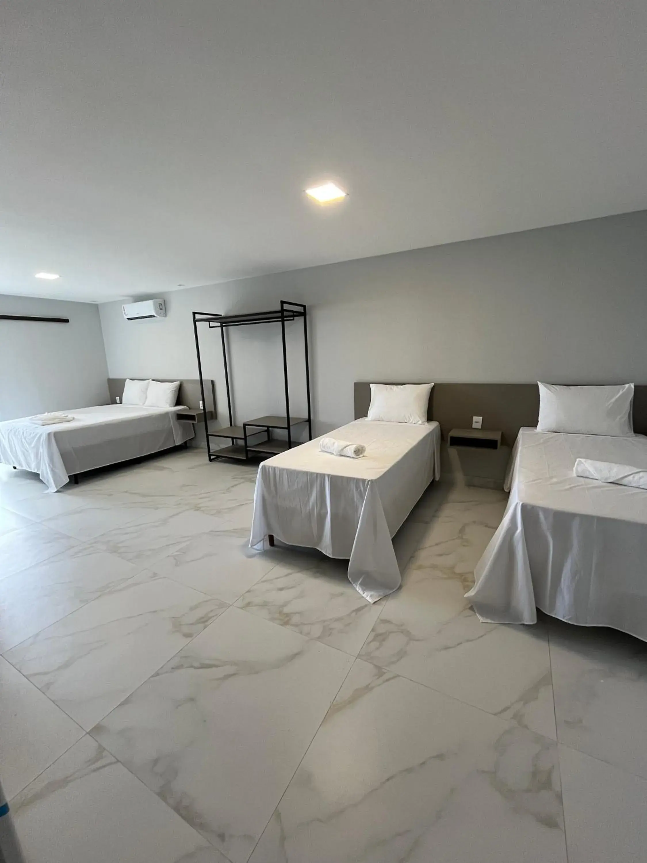 Quadruple Room - single occupancy in Piúma Palace Hotel Quadruple Room - single occupancy in Piúma Palace Hotel