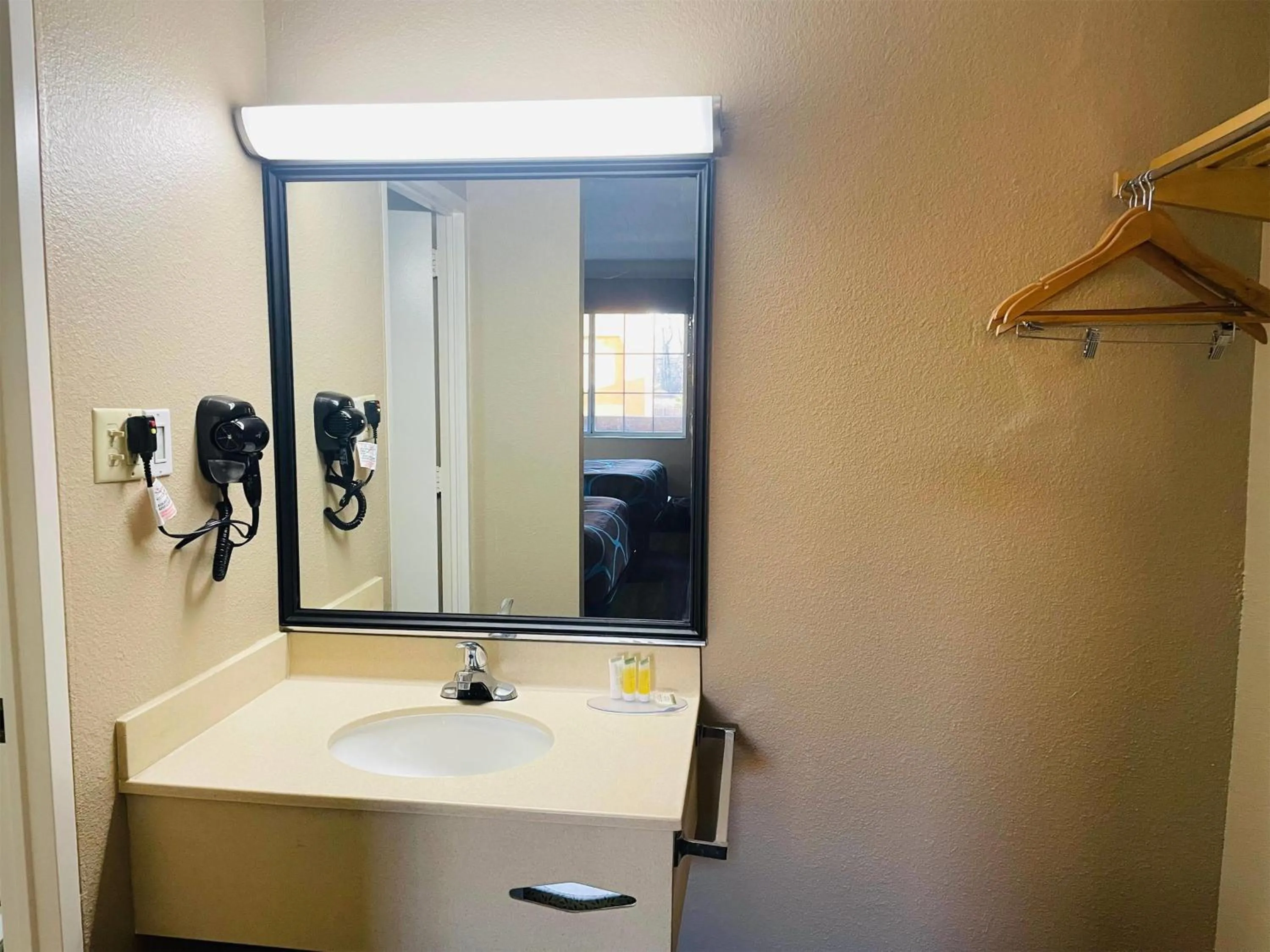 Bathroom in Super 8 by Wyndham Gloucester